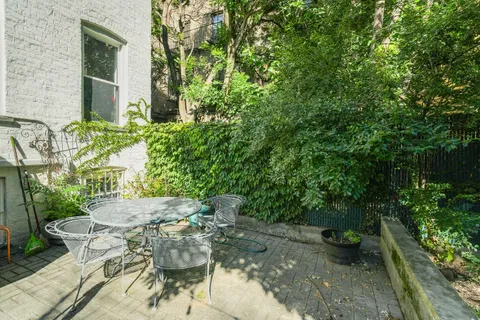 a view of an outdoor space with a patio