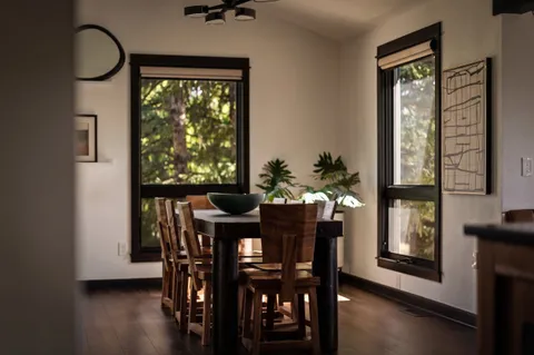 a kitchen with granite countertop a sink and a stove