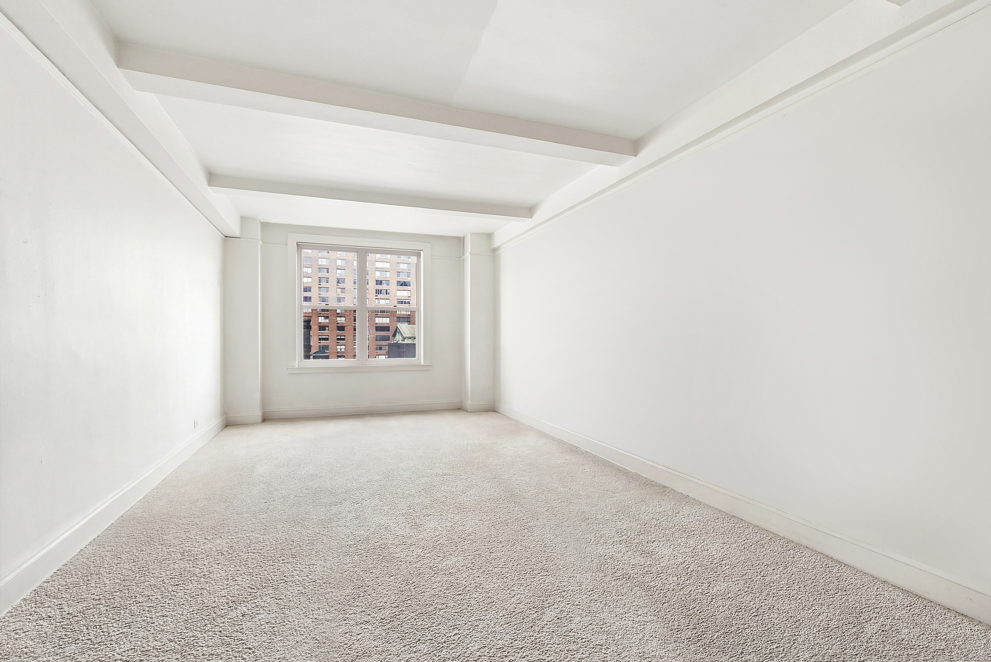 12 West 96th Street, Unit 9A Manhattan, NY 10025 - Photo 6 of 14 an empty room with windows