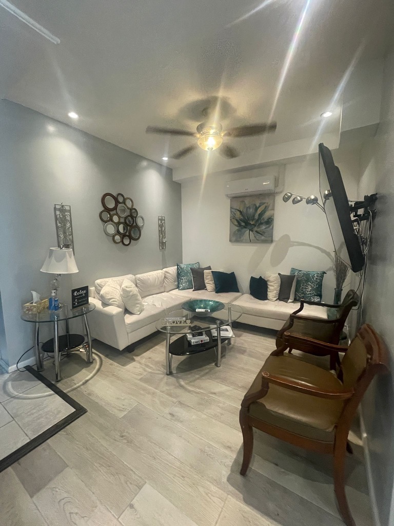 88-13 Corona Avenue, Unit 2 Queens, NY 11373 - Photo 3 of 7 a living room with furniture