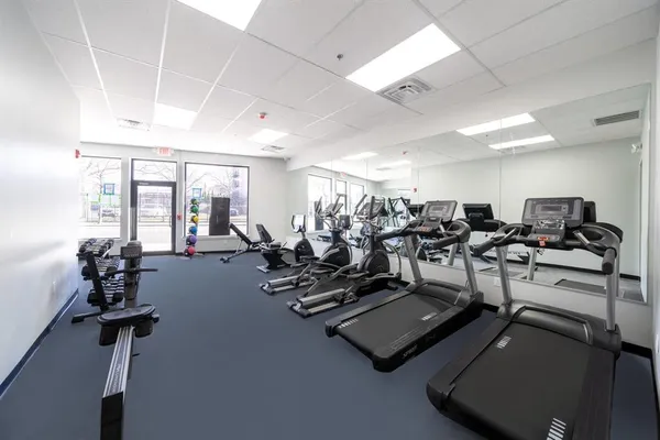 a view of a room with gym equipment