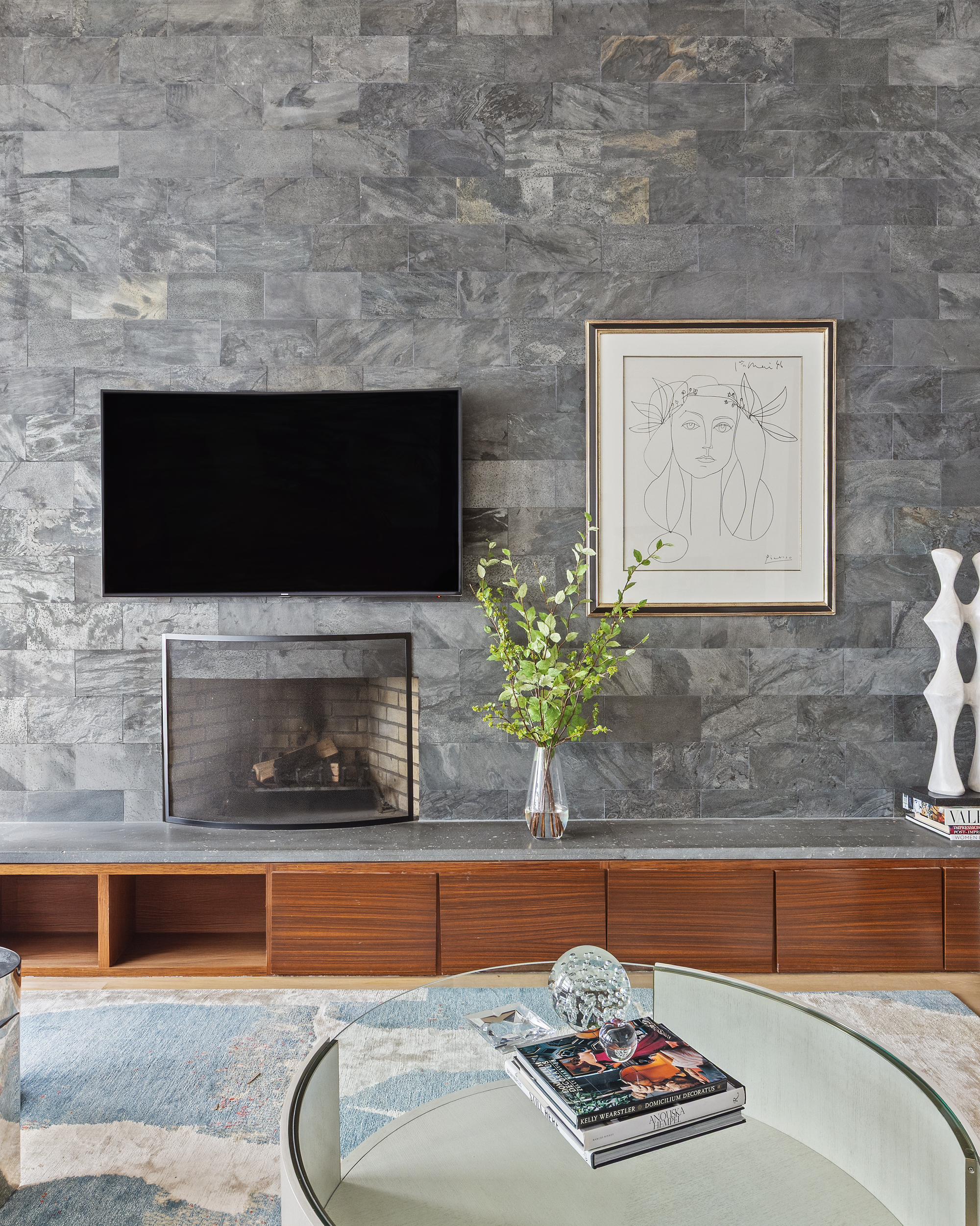 157 East 84th Street, Unit THA Manhattan, NY 10028 - Photo 8 of 33 a living room with fireplace furniture and a flat screen tv