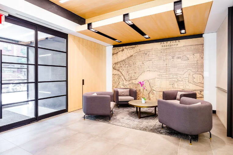 1330 5th Avenue, Unit 3F Manhattan, NY 10026 - Photo 13 of 16 a living room with furniture