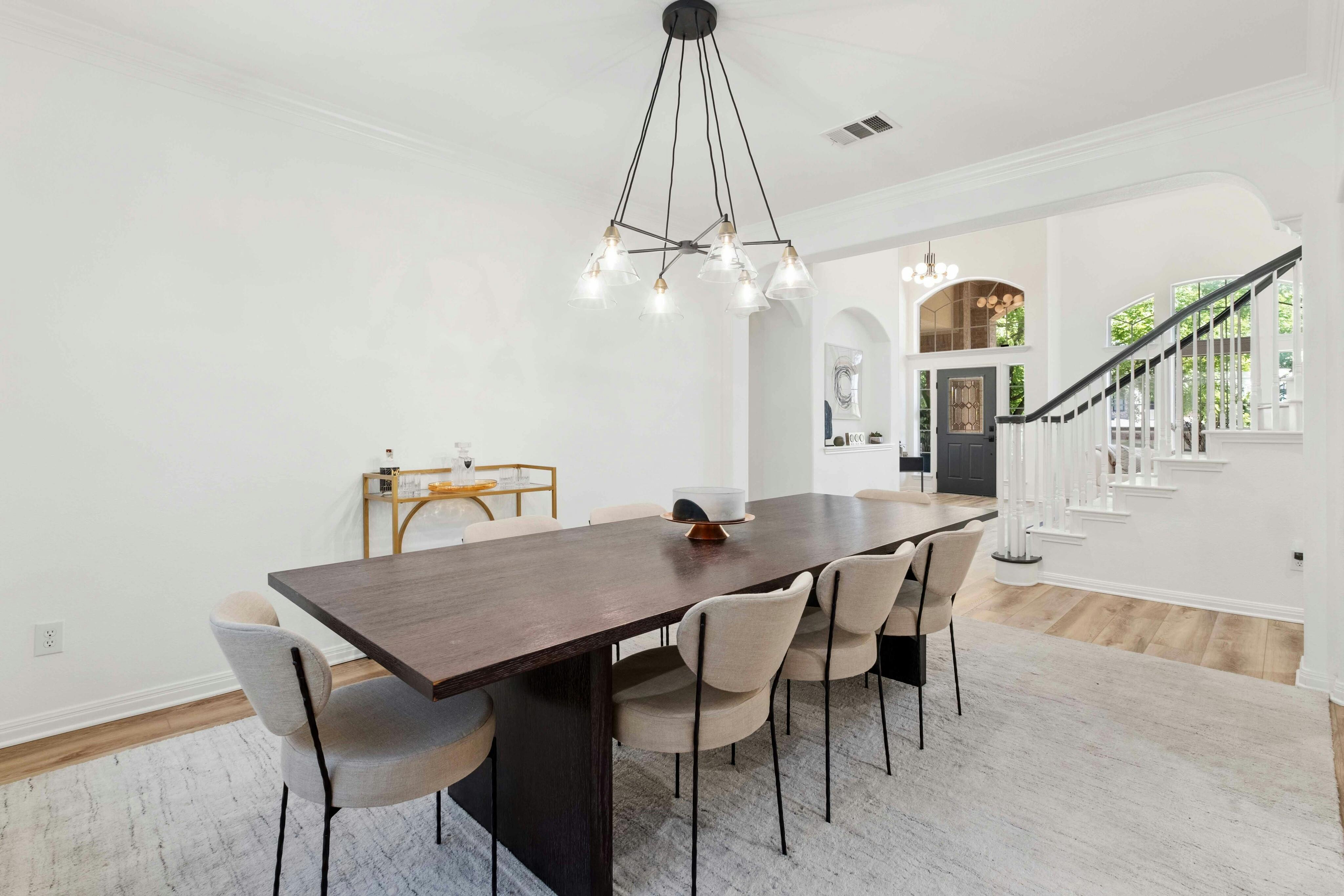 10608 Pointe View Drive Austin, TX 78738 - Photo 10 of 46 a view of a dining room with furniture and wooden floor