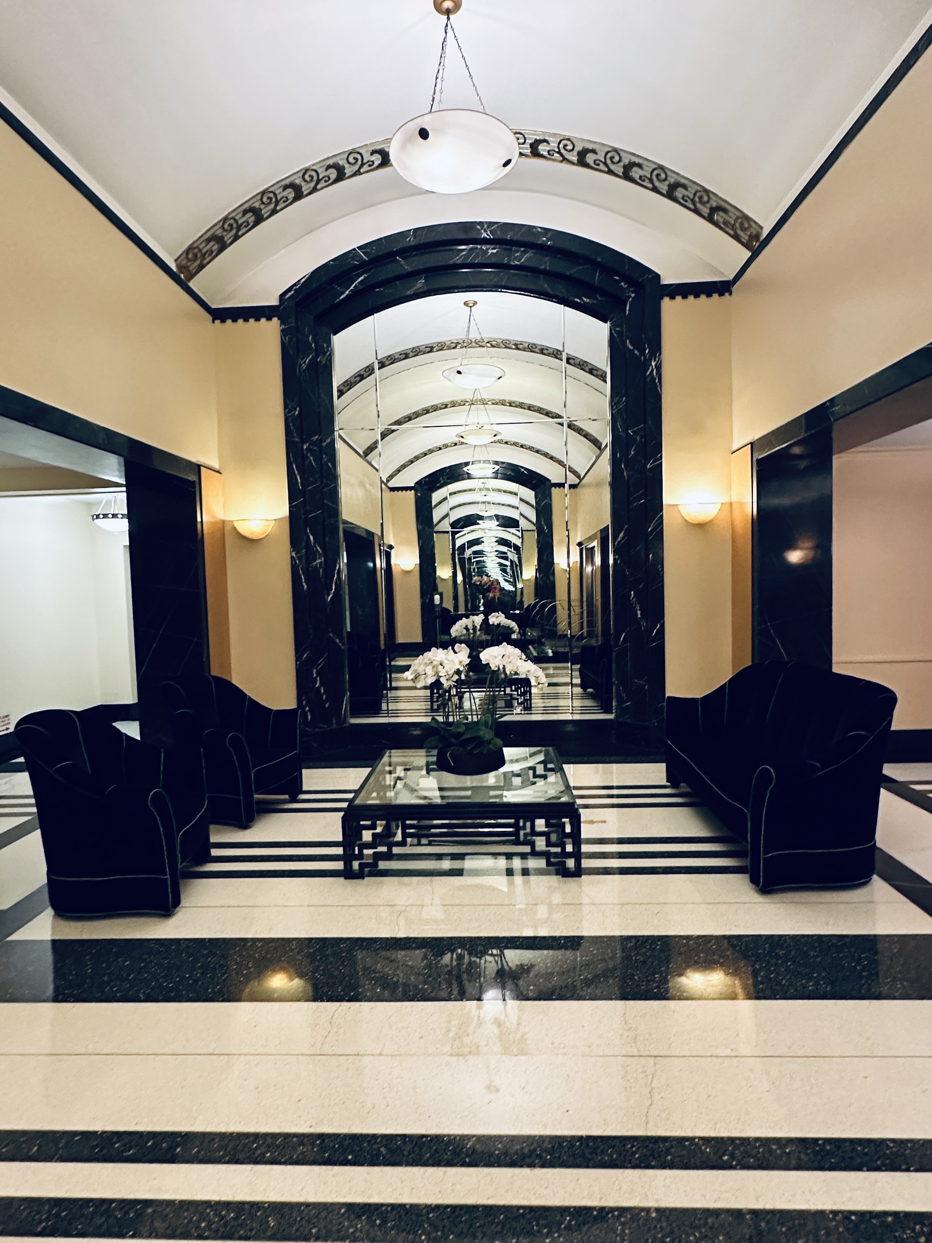 19 East 88th Street, Unit 3H Manhattan, NY 10128 - Photo 6 of 7 a living room with furniture and a fireplace