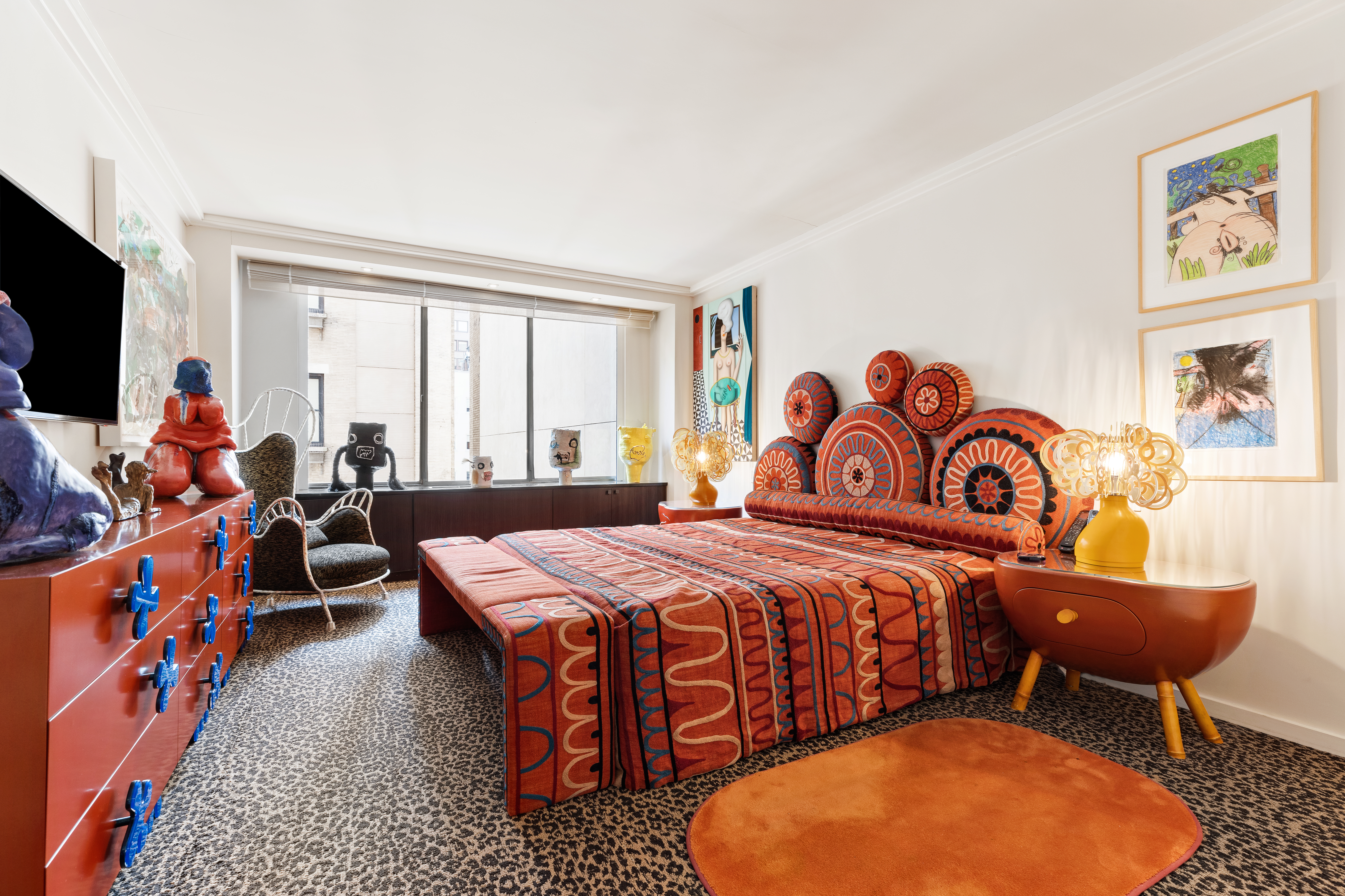 1001 5th Avenue, Unit 4C Manhattan, NY 10028 - Photo 5 of 11 a bedroom with two beds and a window