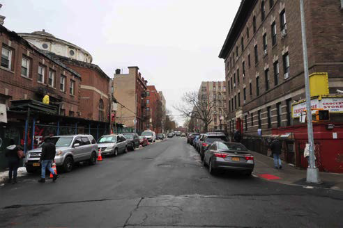 1800 Grand Concourse Bronx, NY 10457 - Photo 5 of 5 a cars parked in front of a building