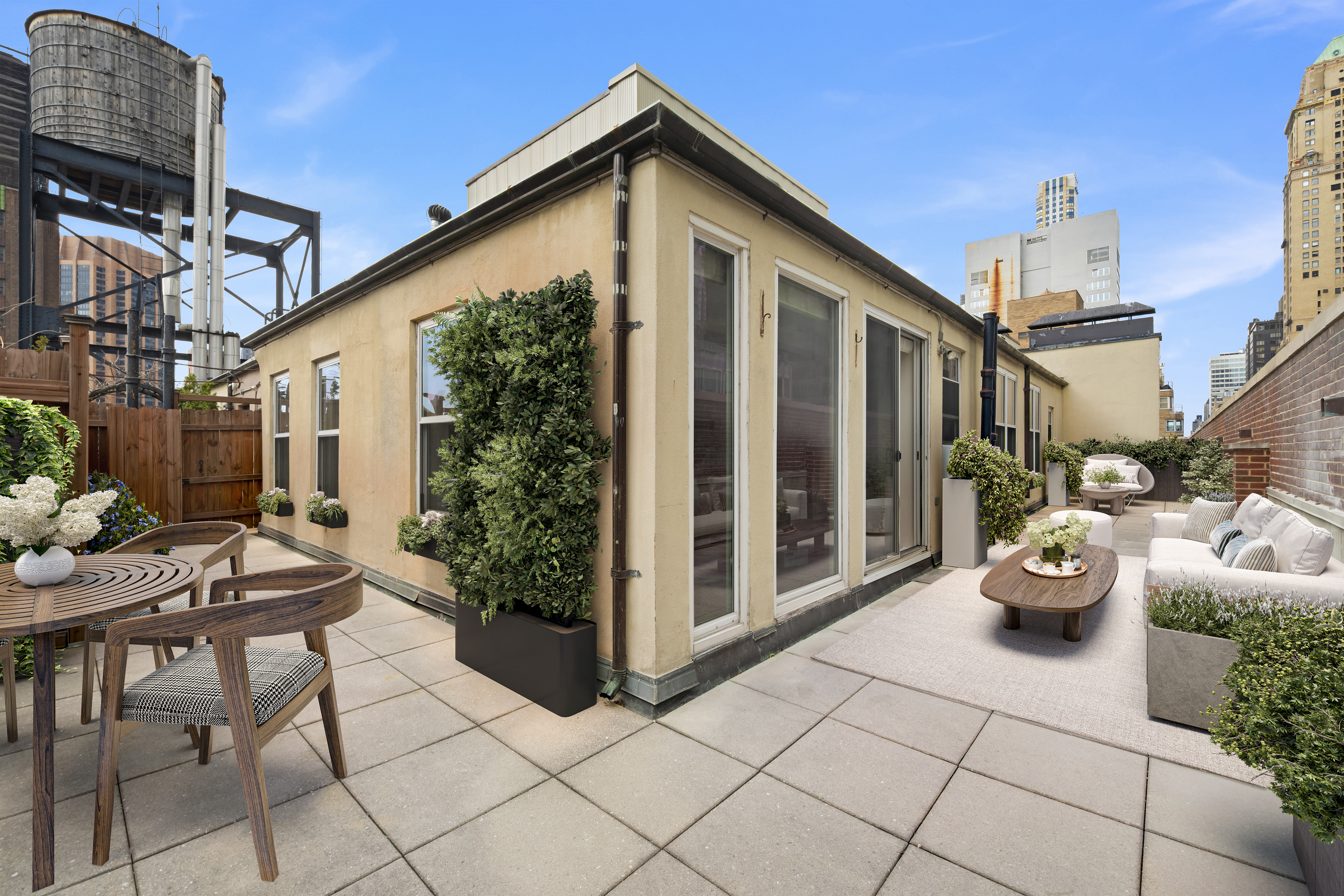 77 Park Avenue, Unit 16G Manhattan, NY 10016 - Photo 1 of 8 a view of a patio with table and chairs potted plants