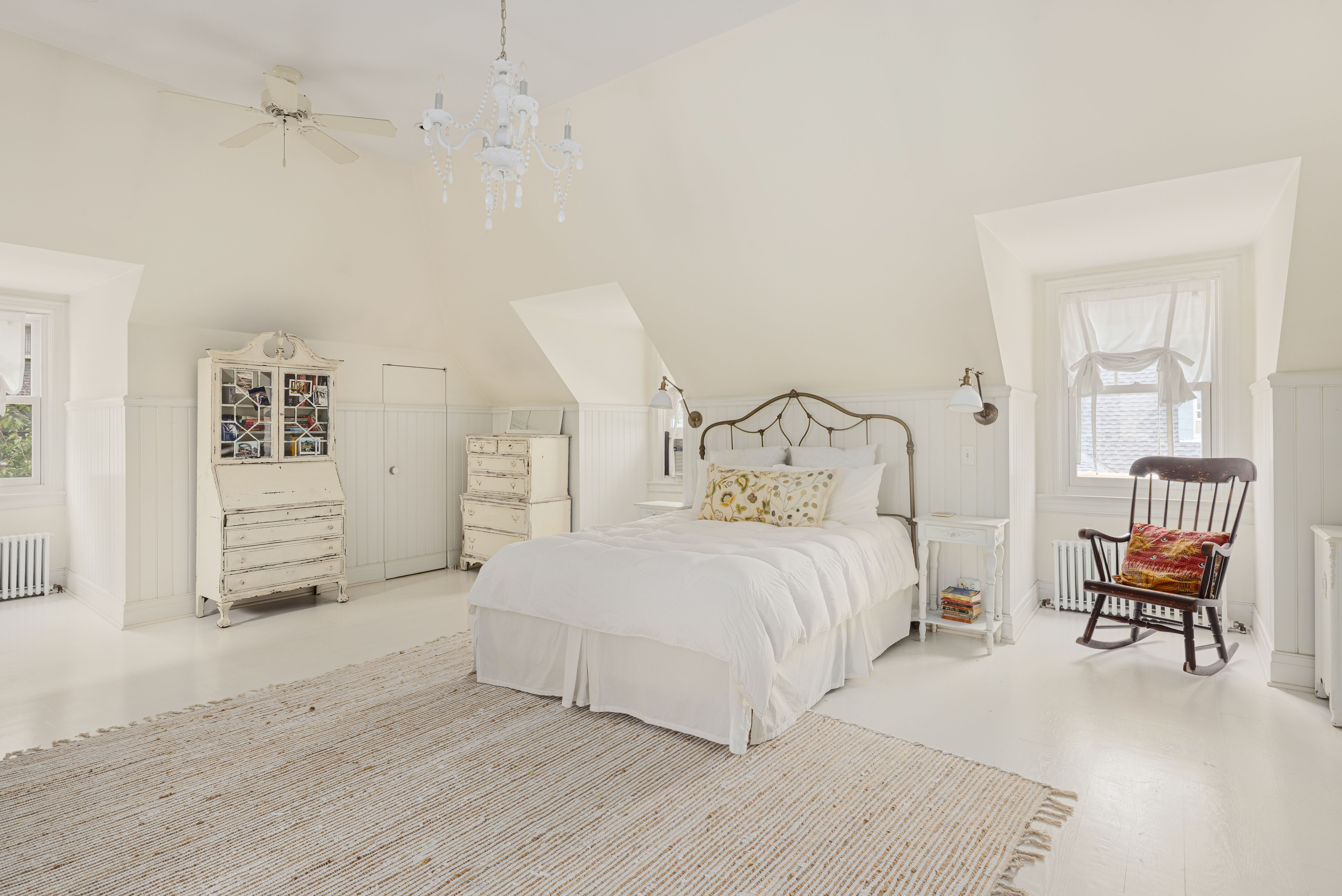 200 Fenimore Street Brooklyn, NY 11225 - Photo 18 of 24 a bedroom with a bed and with chair