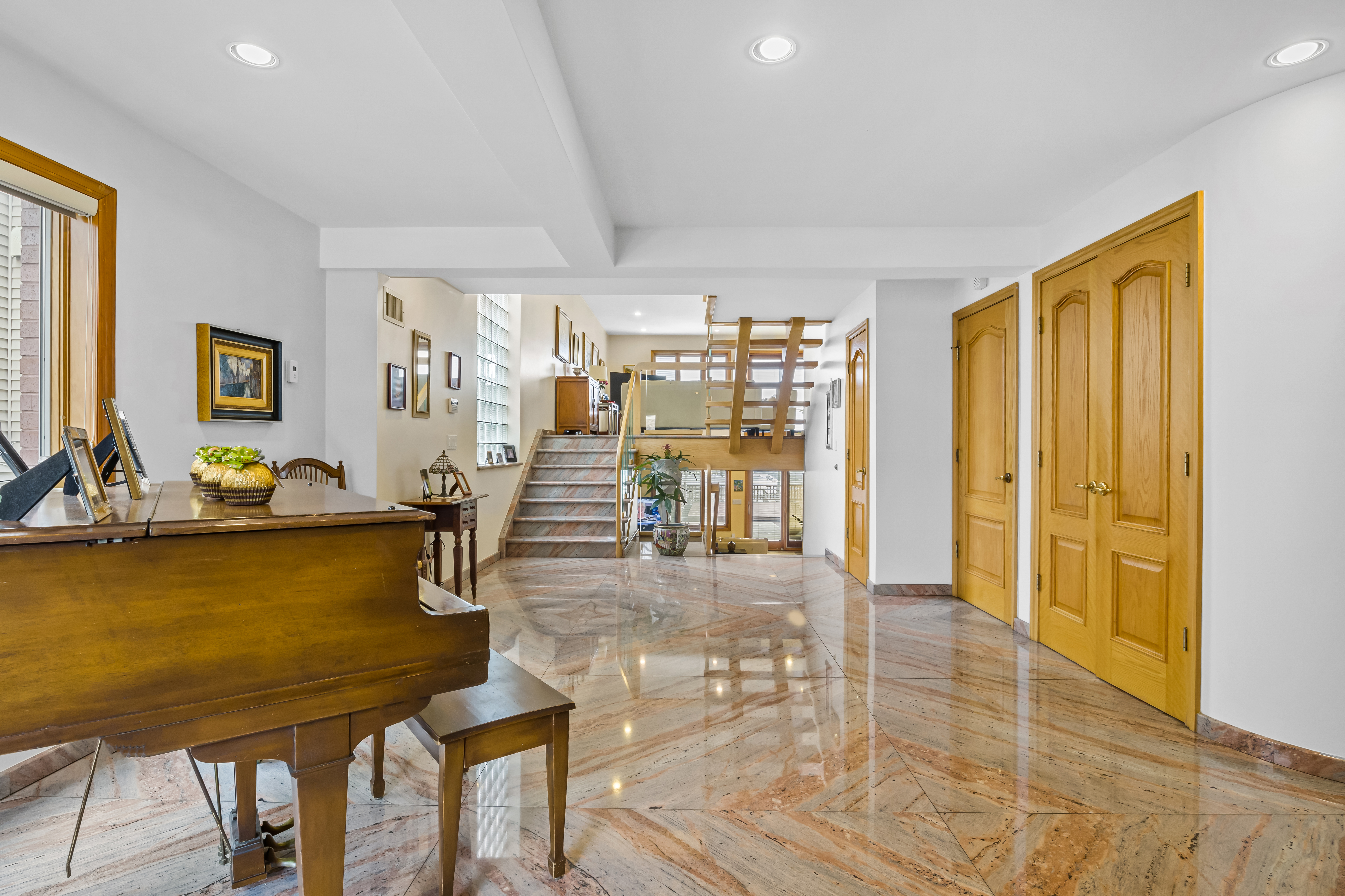 303 Whitman Drive Brooklyn, NY 11234 - Photo 11 of 37 a view of a living room and dining room