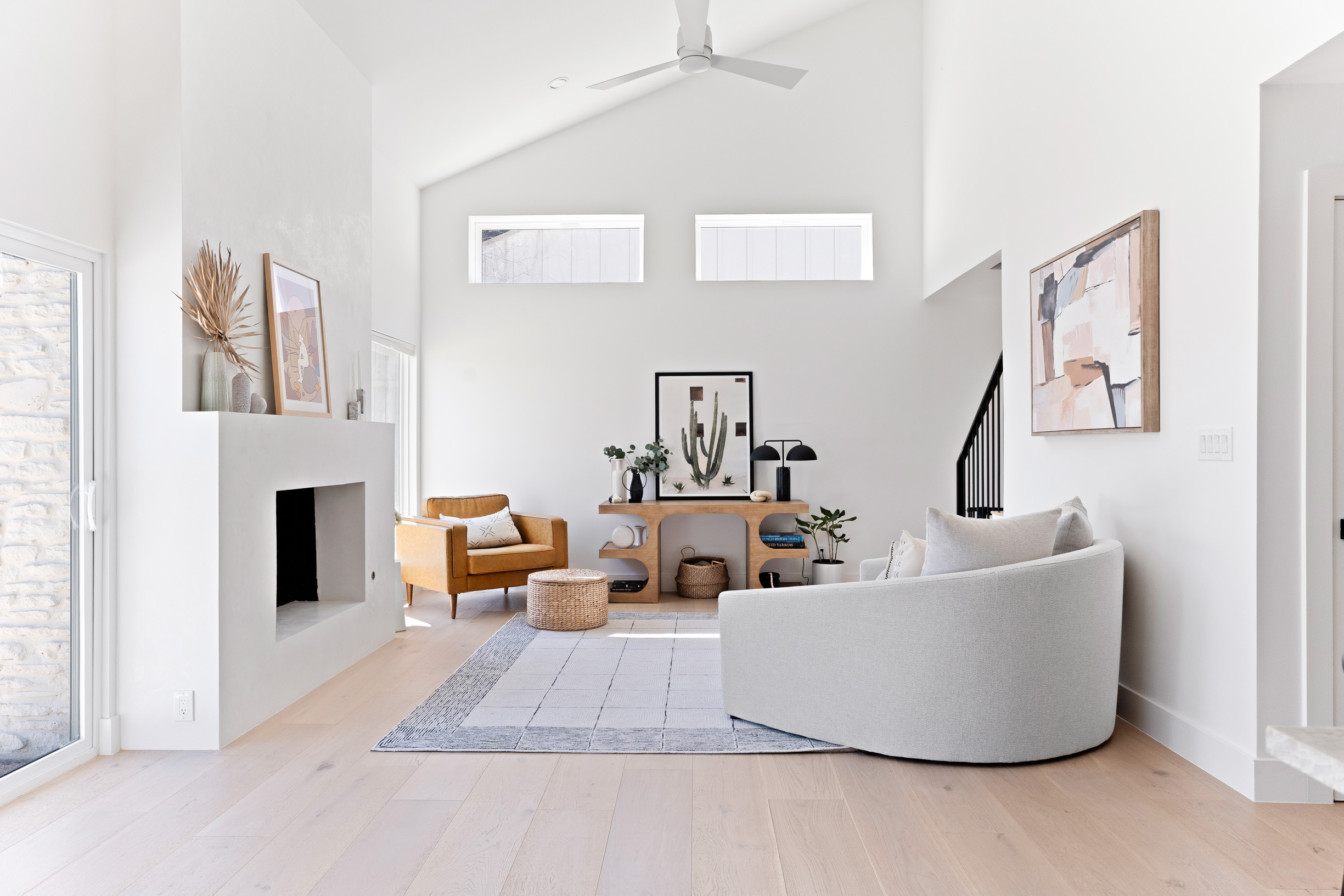 1317 Thaddeus Cove Austin, TX 78746 - Photo 4 of 22 a living room with furniture and a fireplace