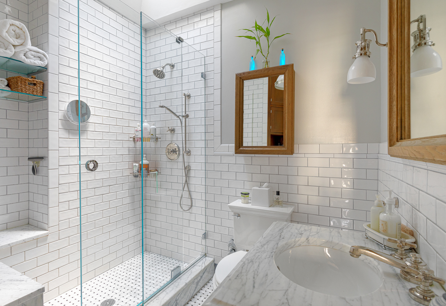 161 West 71st Street, Unit 4 Manhattan, NY 10023 - Photo 8 of 15 a bathroom with a sink a toilet and shower