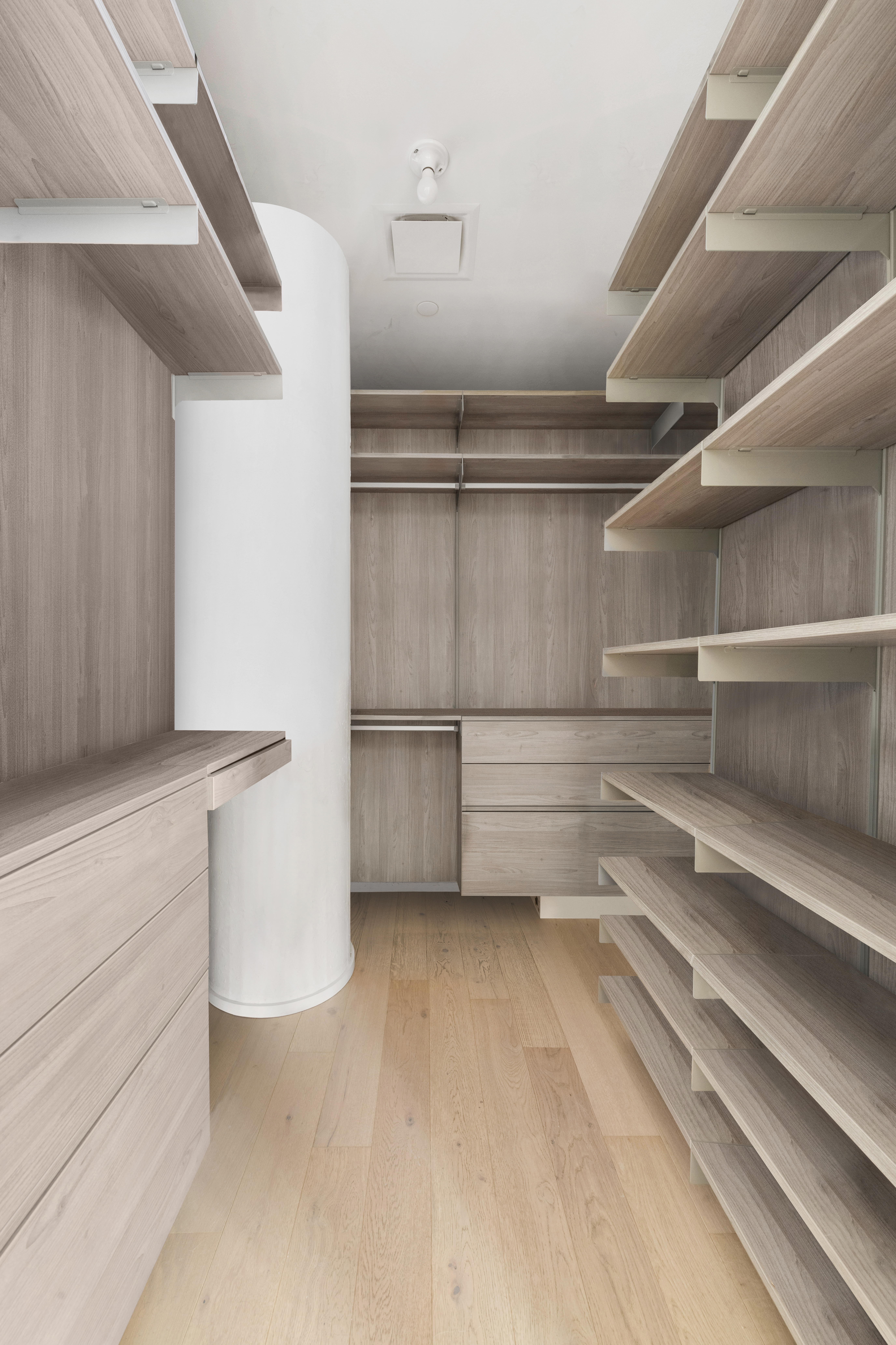 168 Plymouth Street, Unit 5A Brooklyn, NY 11201 - Photo 12 of 19 a view of walk in closet with empty racks