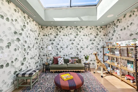 a living room with a couch and a table