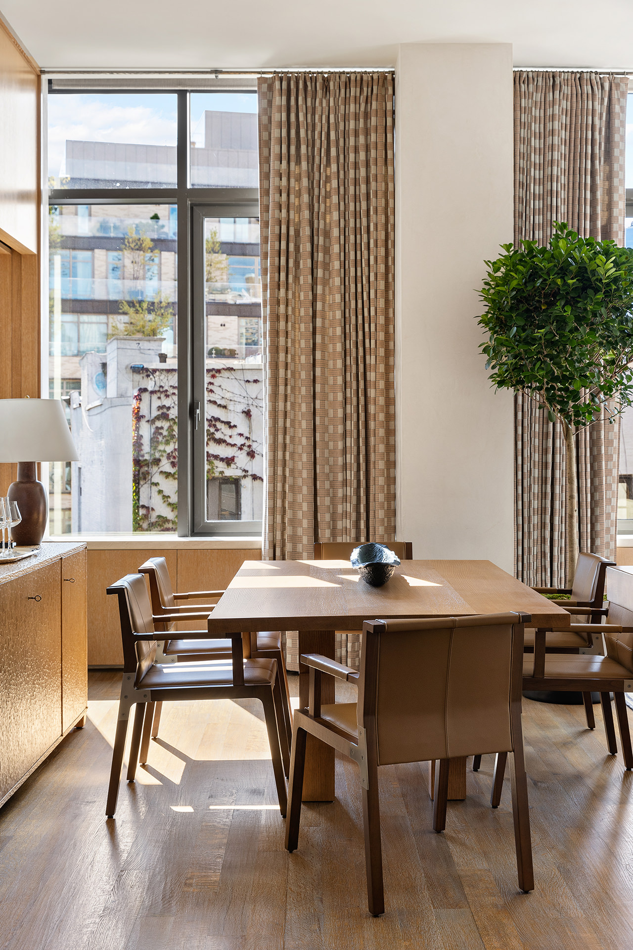 25 Bond Street, Unit PHW Manhattan, NY 10012 - Photo 10 of 34 a view of a workspace with furniture and window in a room