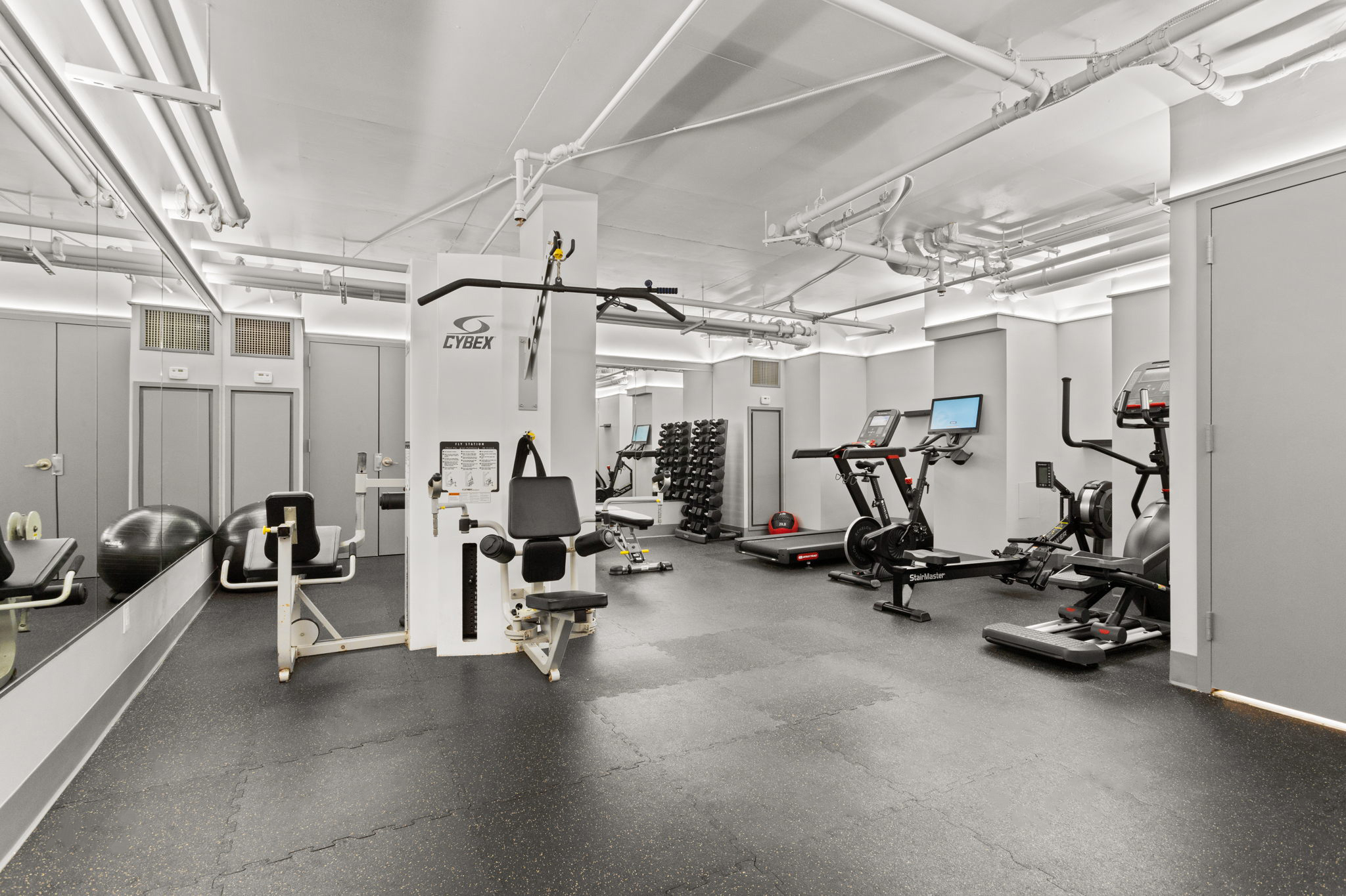 350 West 53rd Street, Unit PHA Manhattan, NY 10019 - Photo 33 of 35 a view of a room with gym equipment