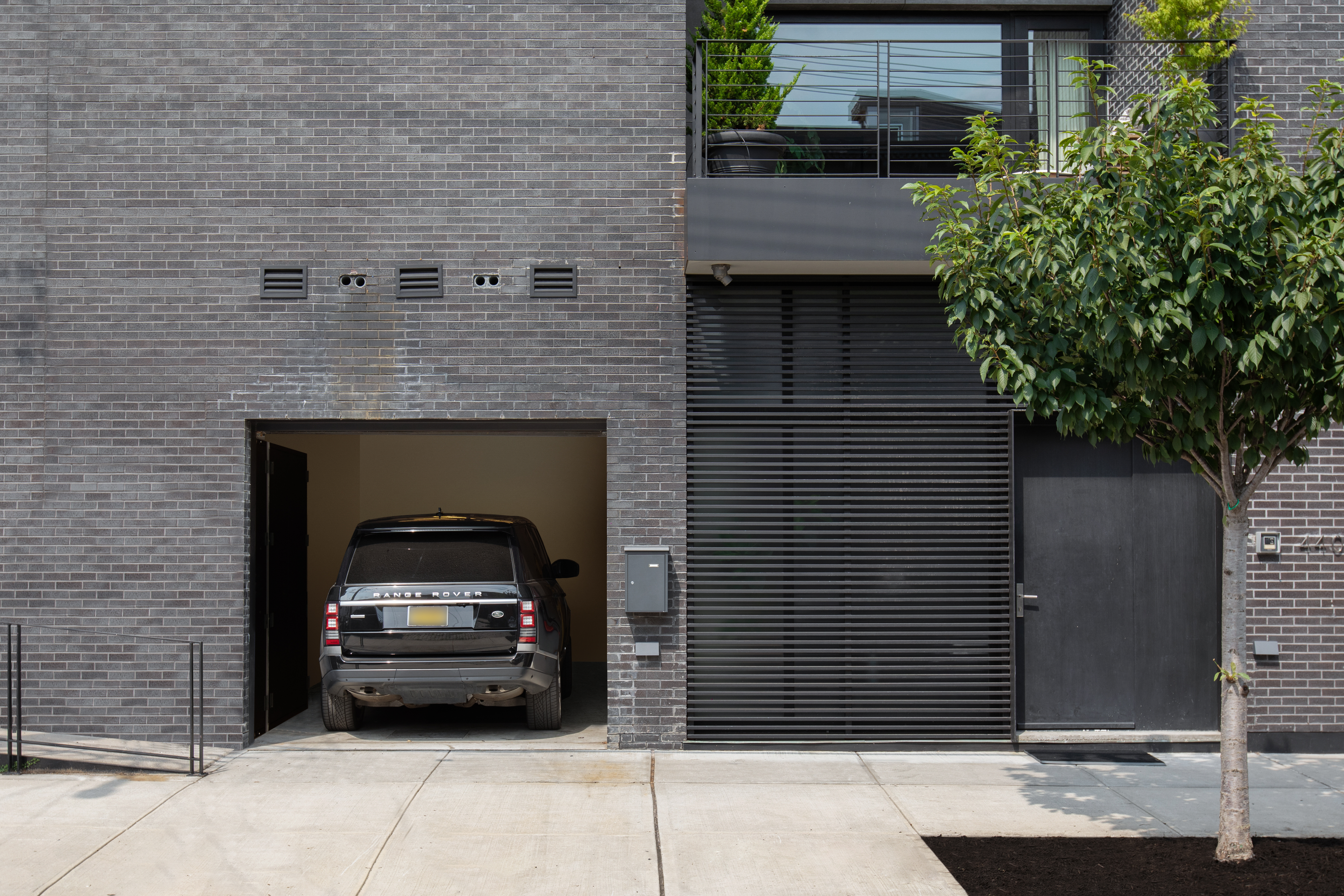 440 Van Brunt Street Brooklyn, NY 11231 - Photo 31 of 33 a car parked in front of a building
