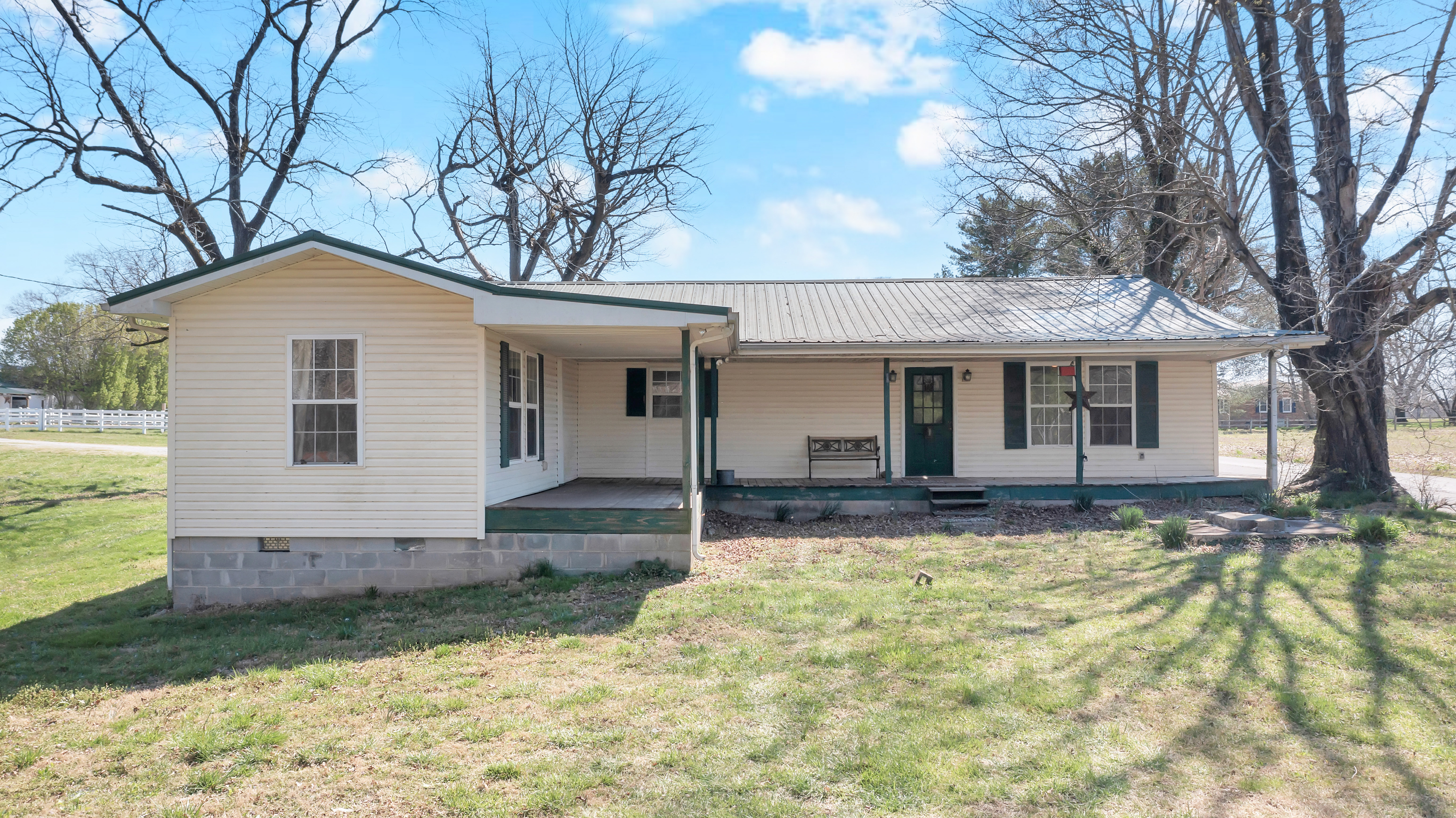 2073 Harpo Road Manchester, TN 37355 - Photo 6 of 45 a front view of a house with a yard