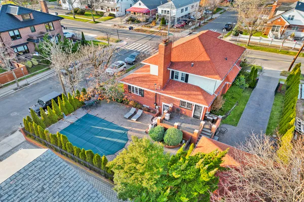 an aerial view of a house with a garden