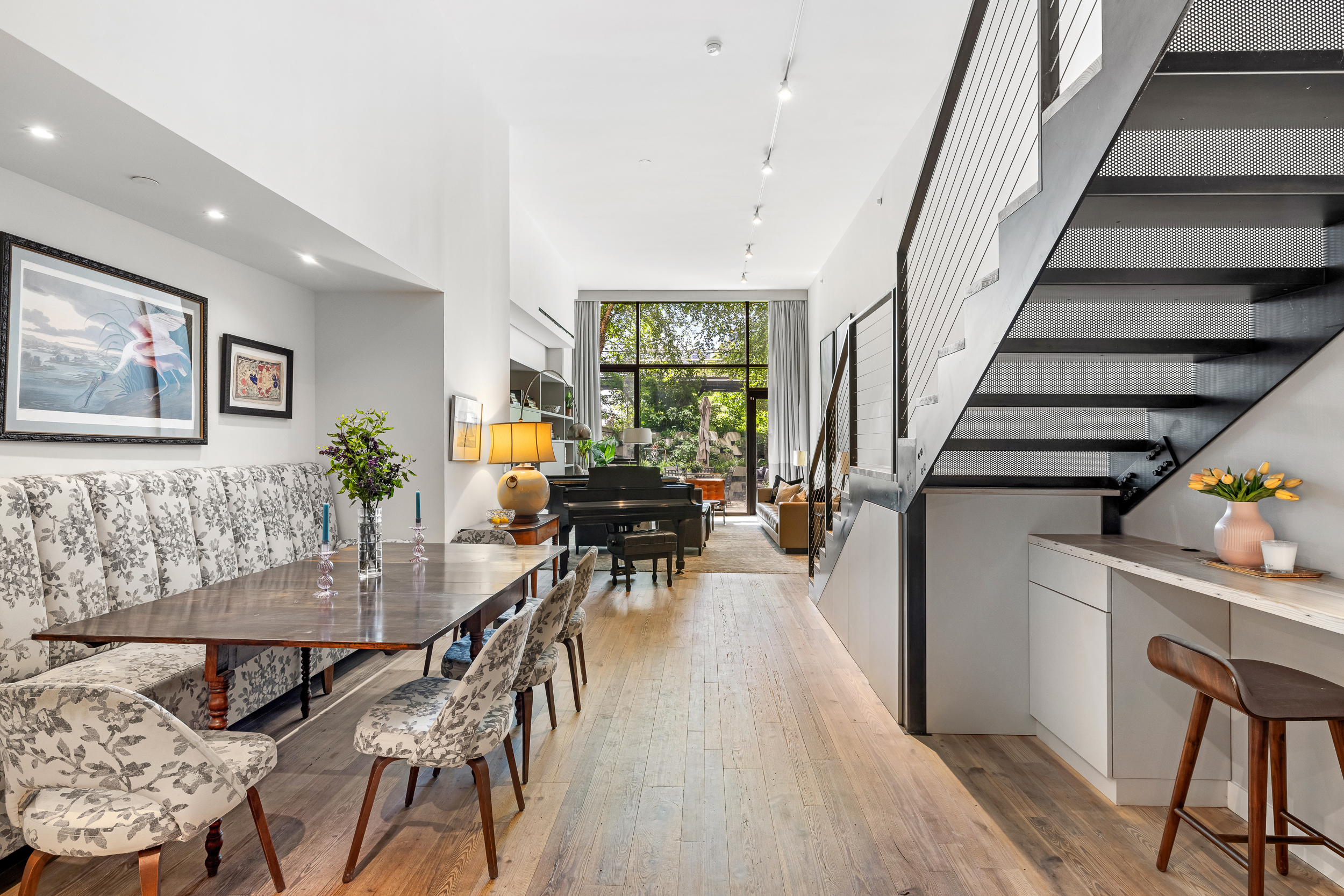 90 Furman Street, Unit N107 Brooklyn, NY 11201 - Photo 4 of 30 a dining room with furniture entryway and wooden floor