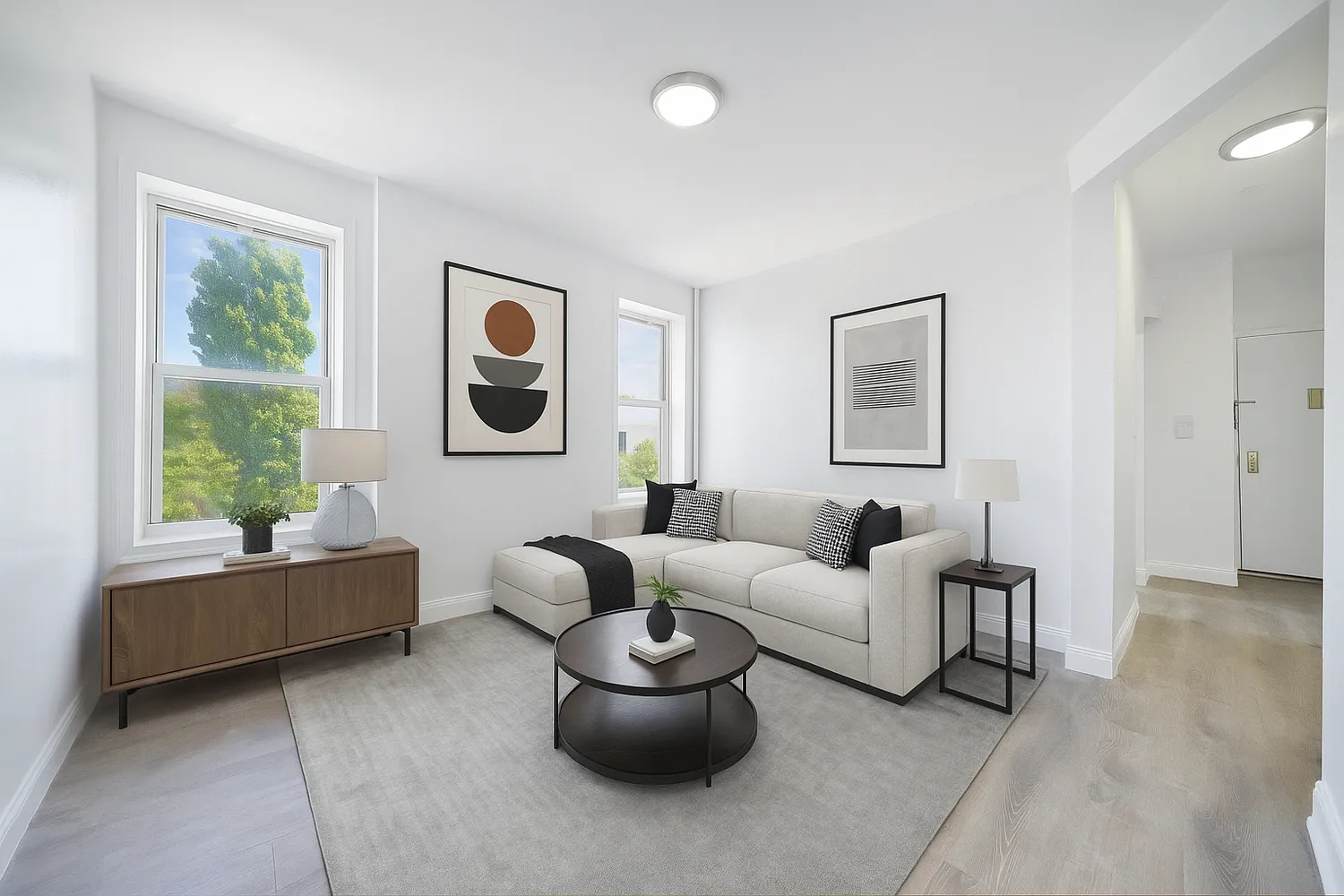 a living room with furniture and a window