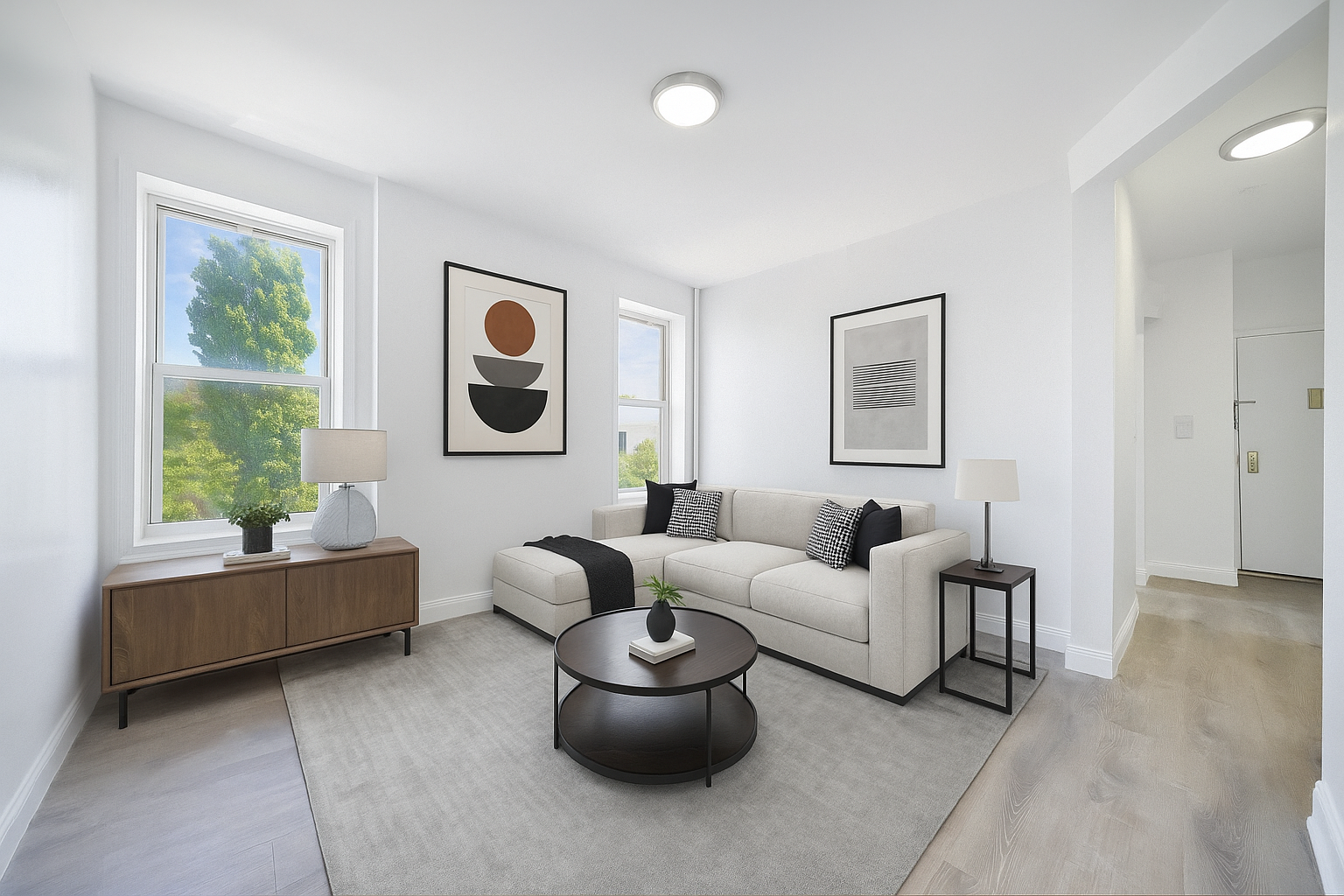 a living room with furniture and a window