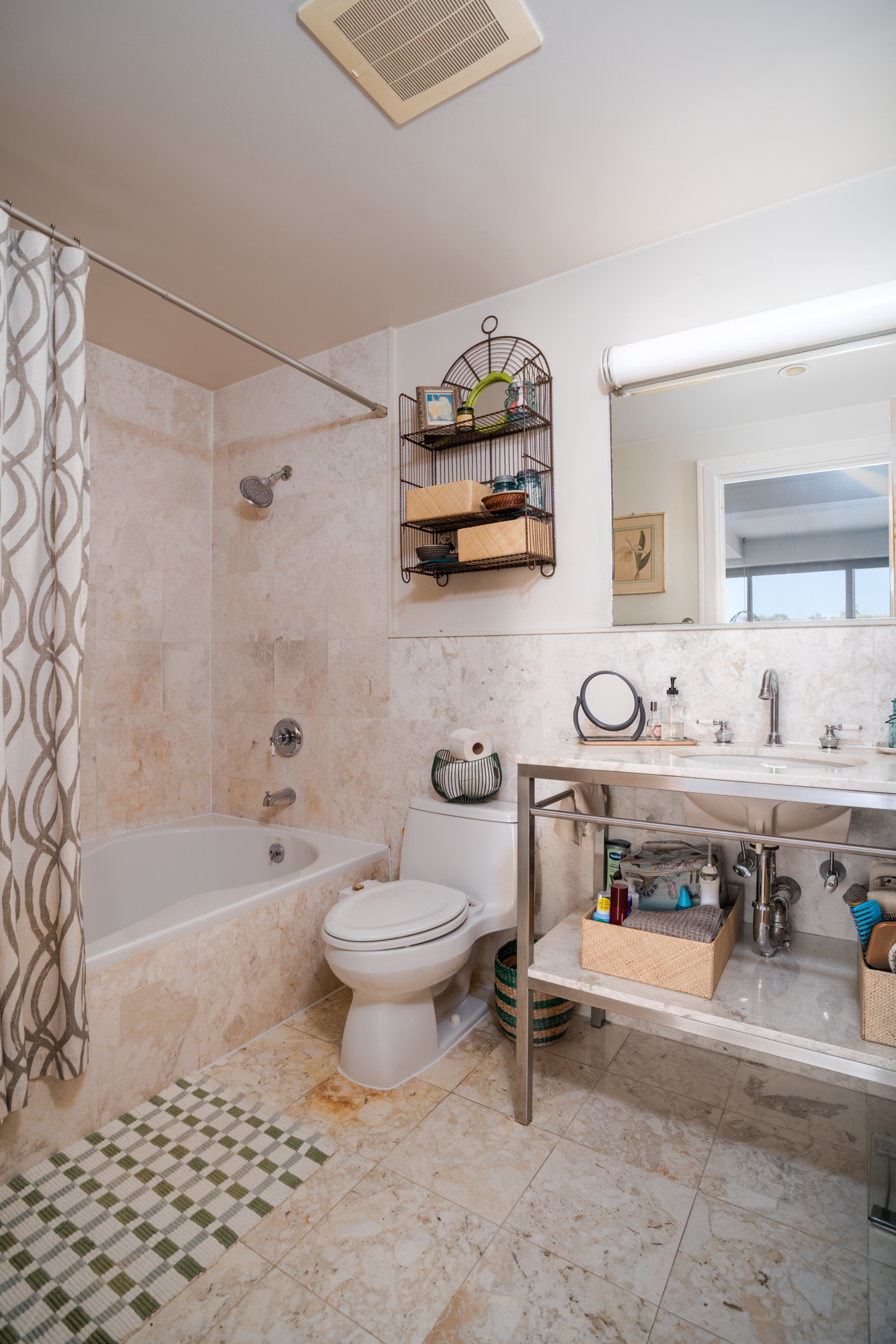 346 Coney Island Avenue, Unit 602 Brooklyn, NY 11218 - Photo 10 of 12 a bathroom with a sink a toilet and a bathtub