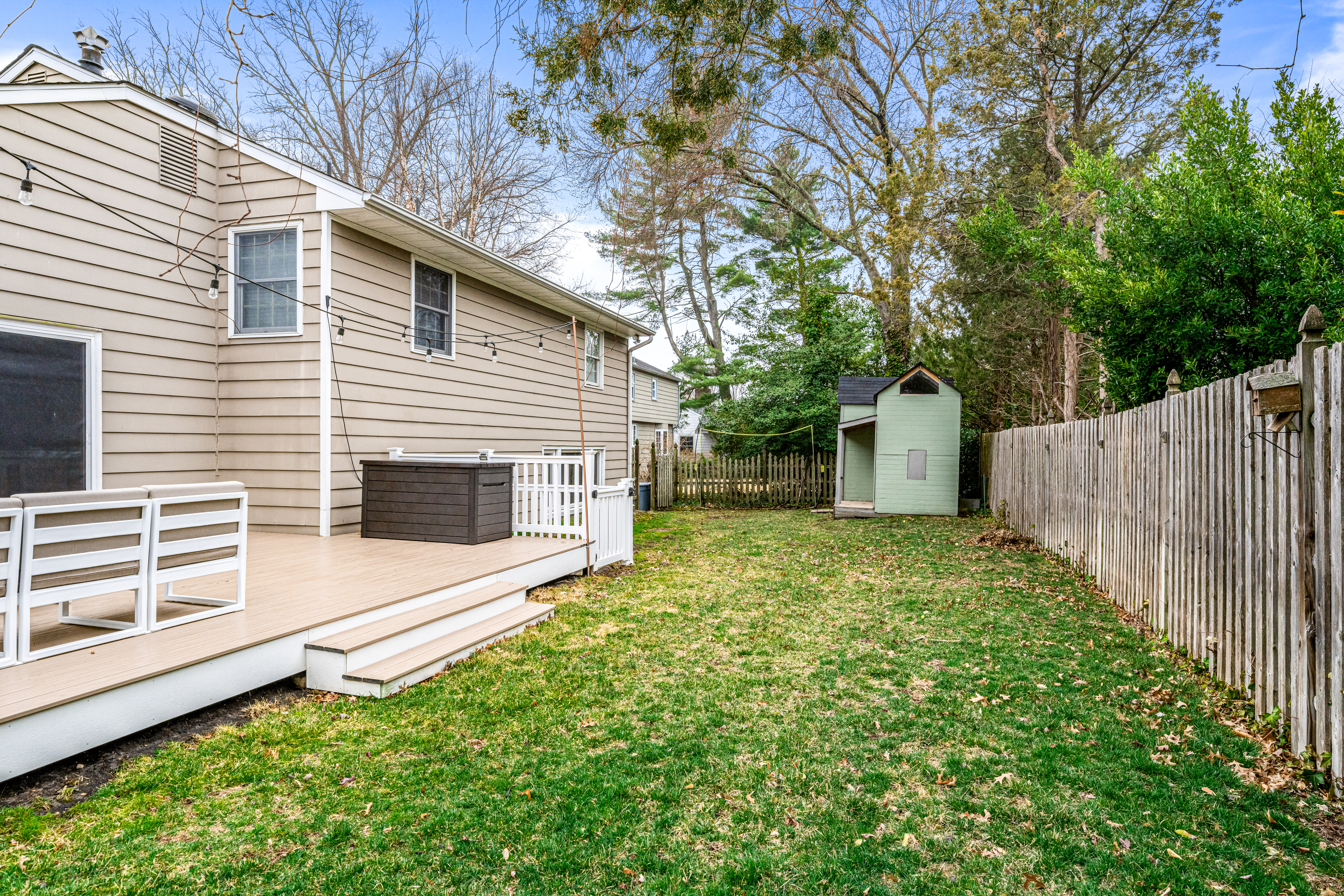 430 Pelham Road Cherry Hill, NJ 08034 - Photo 46 of 48 a view of a backyard with a garden and trees