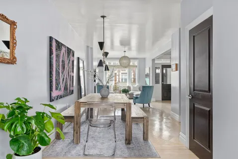 a view of a dining room with furniture