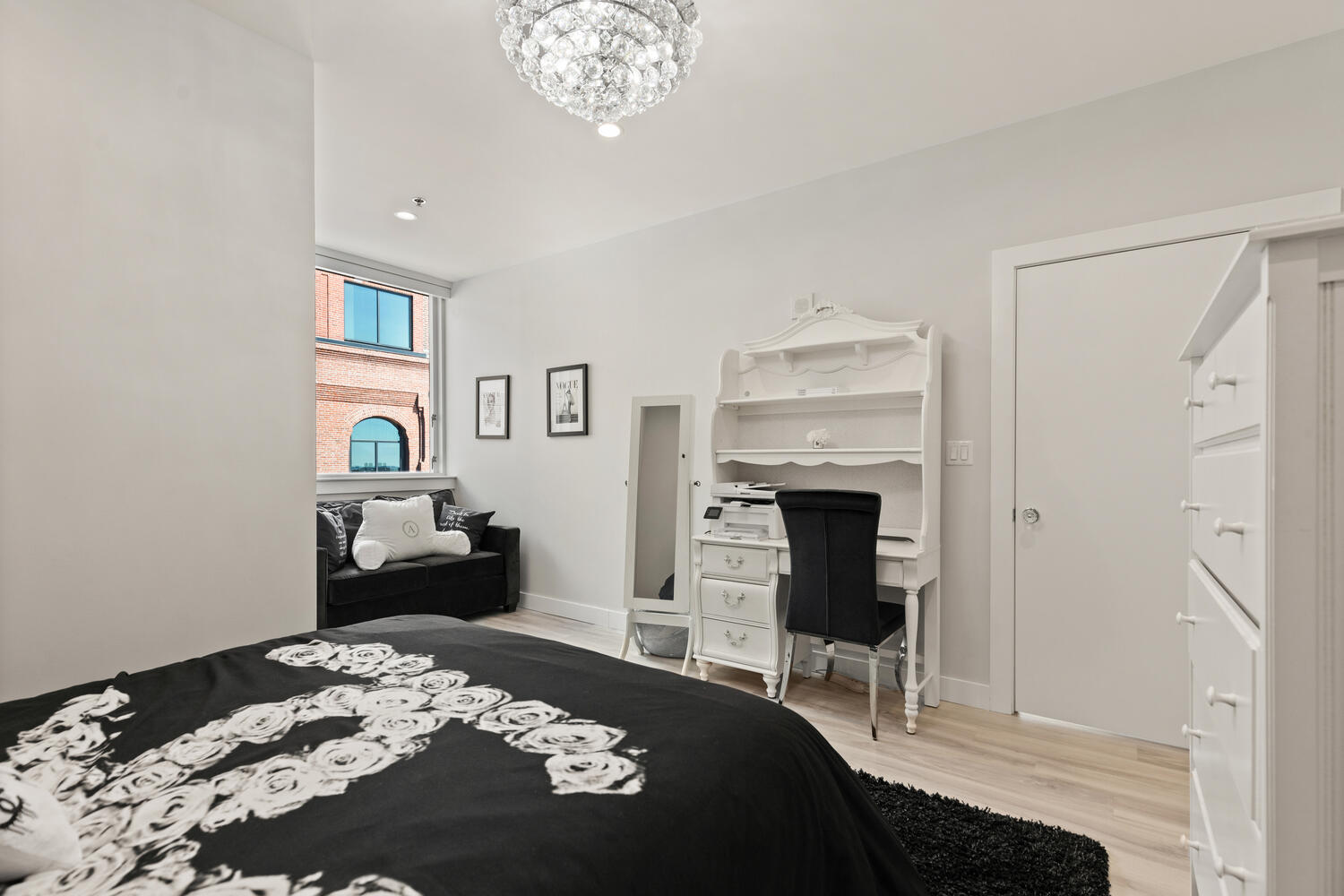 234 Causeway Street, Unit 709 Boston, MA 02114 - Photo 12 of 28 a bedroom with a bed and a fireplace