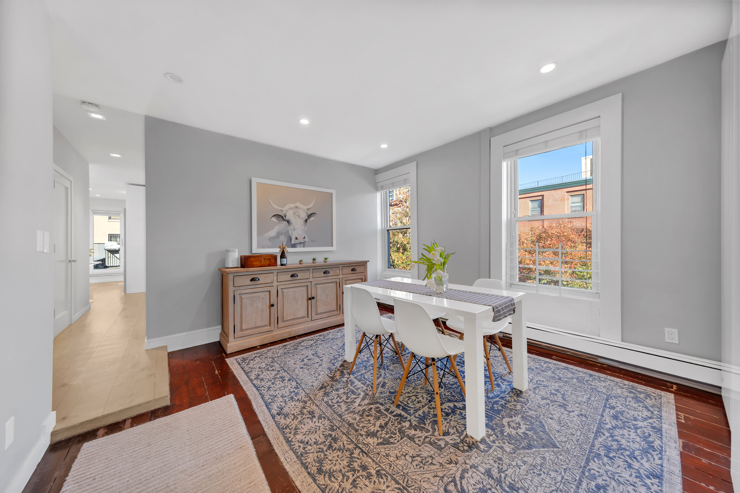 39 Clifton Place Brooklyn, NY 11238 - Photo 6 of 32 a living room with dining room and wooden floor