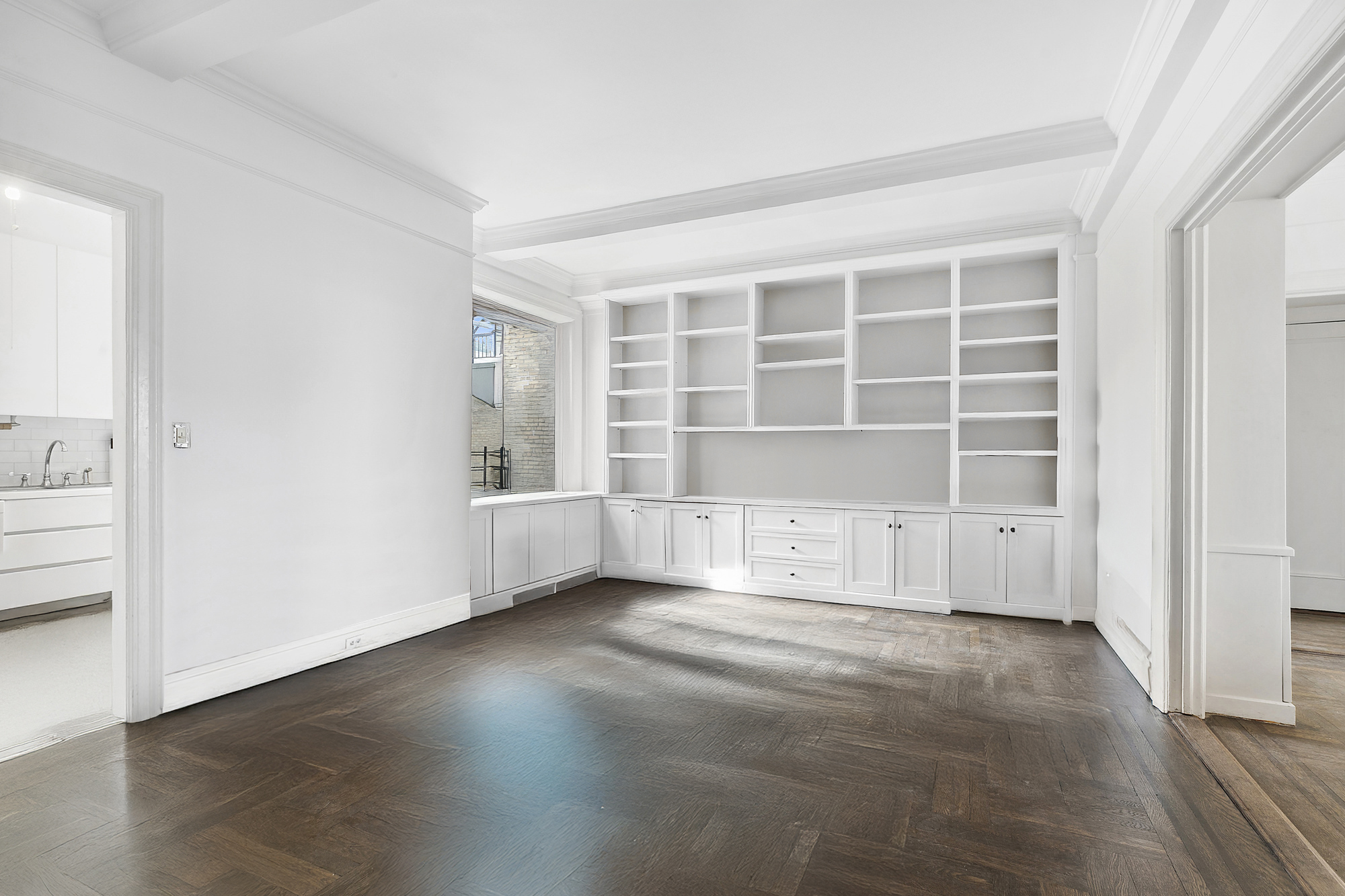 215 West 92nd Street, Unit 15A Manhattan, NY 10025 - Photo 8 of 14 an empty room with windows