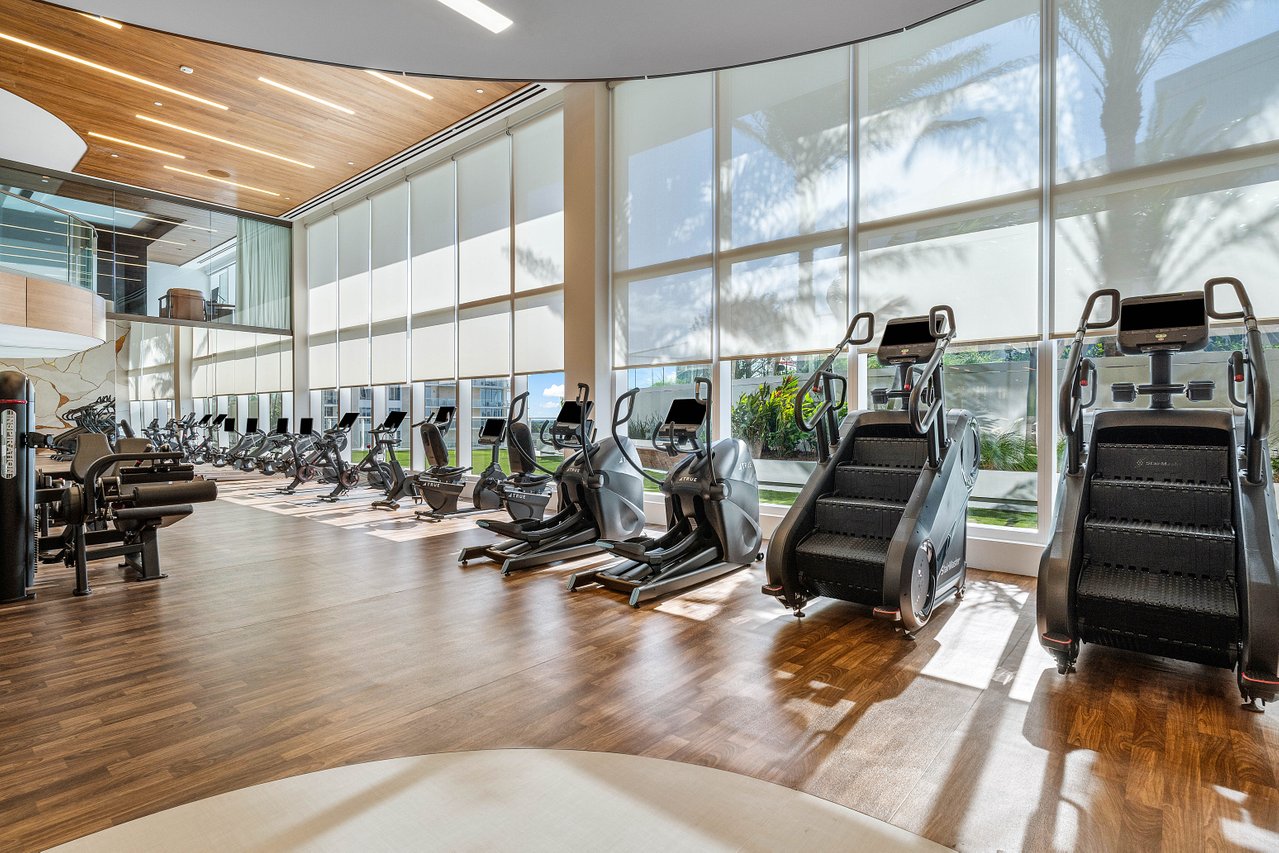 210 Southeast Mizner Boulevard, Unit 101 Boca Raton, FL 33432 - Photo 24 of 31 a view of a room with gym equipment