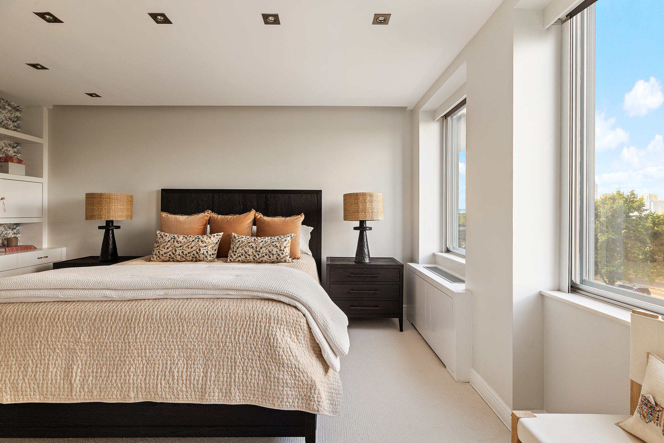 167 Perry Street, Unit 4NQ Manhattan, NY 10014 - Photo 13 of 20 a bedroom with a bed and wooden floor