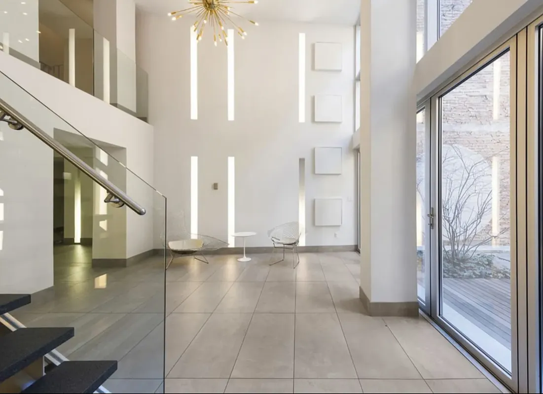 420 West 25th Street, Unit TH1E Manhattan, NY 10001 - Photo 17 of 22 a view of an entryway with an empty room