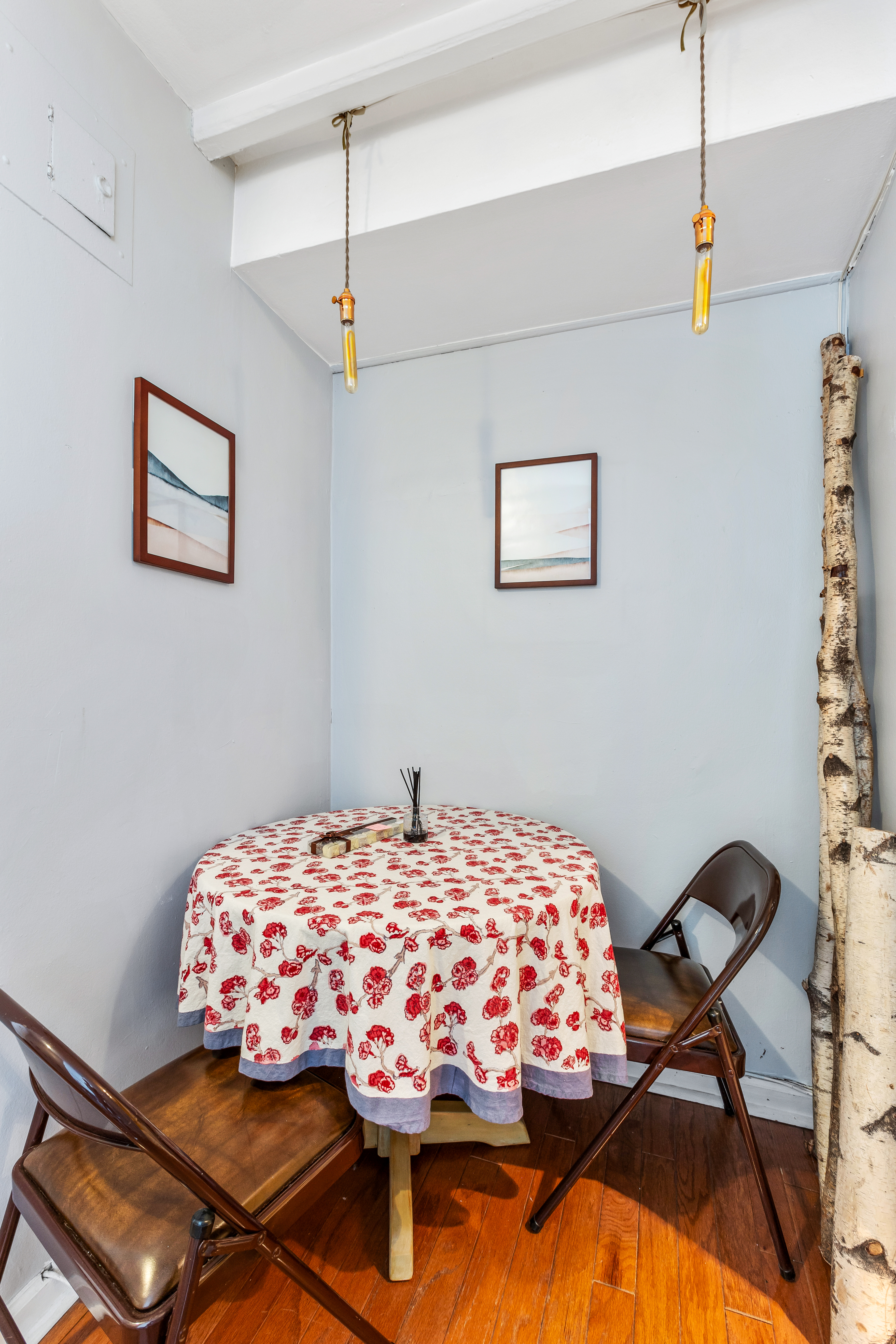 345 East 81st Street, Unit 19A Manhattan, NY 10028 - Photo 9 of 22 a bedroom with a bed and a chandelier