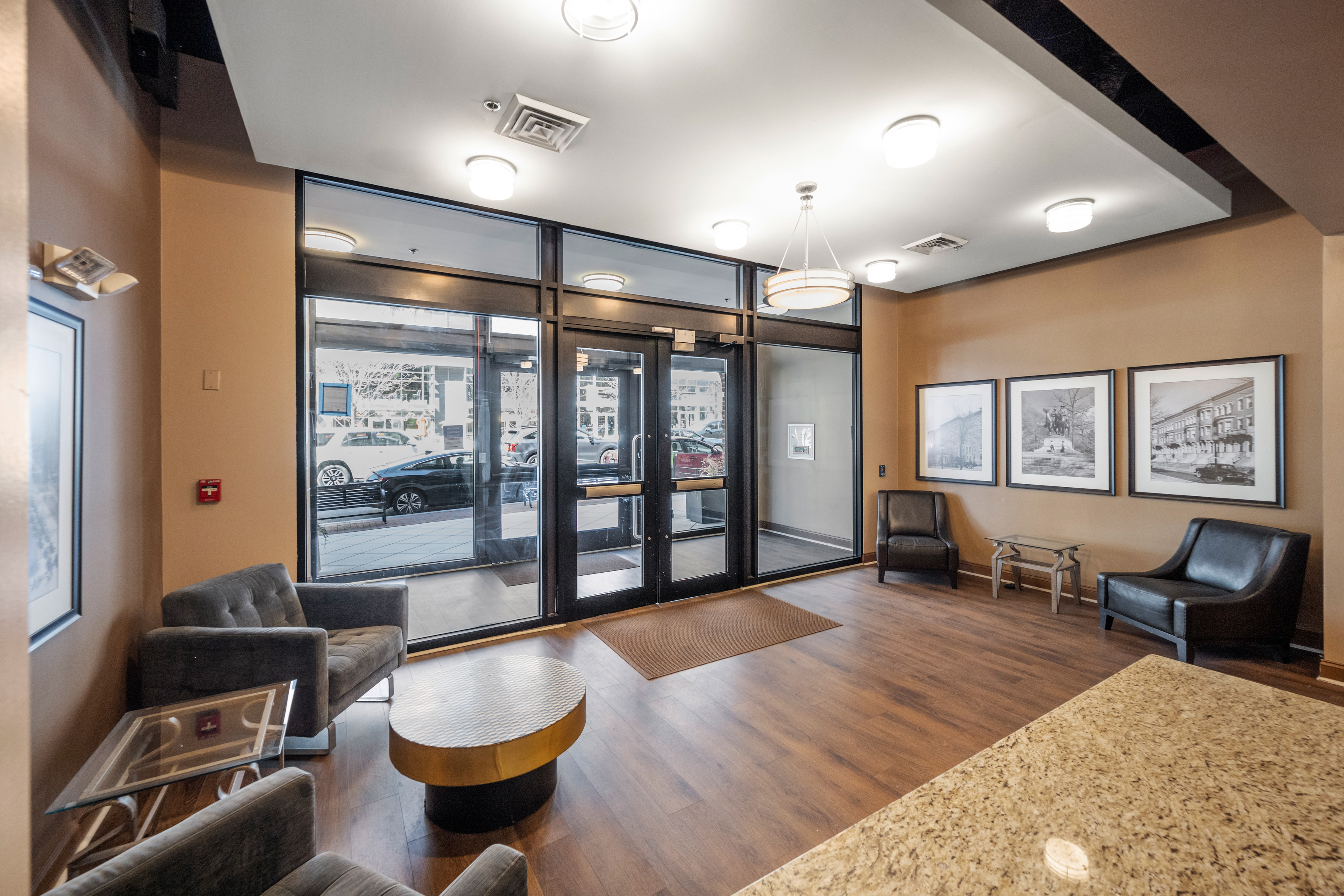3201 St Paul Street, Unit 310 Baltimore, MD 21218 - Photo 2 of 20 a living room with furniture and a large window