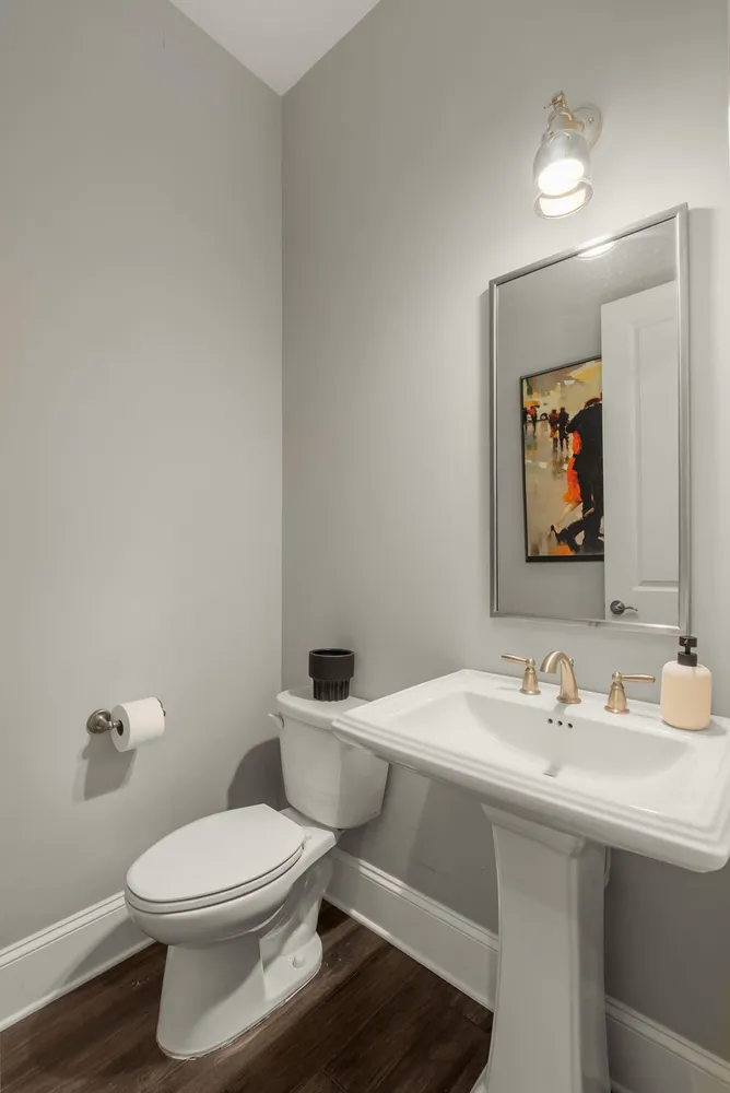 a view of a livingroom with furniture and windows