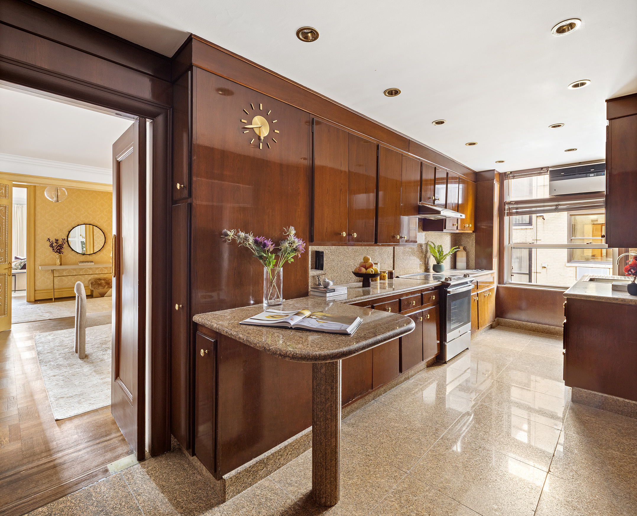 875 Park Avenue, Unit 11C Manhattan, NY 10075 - Photo 10 of 25 a kitchen with counter top space and sink