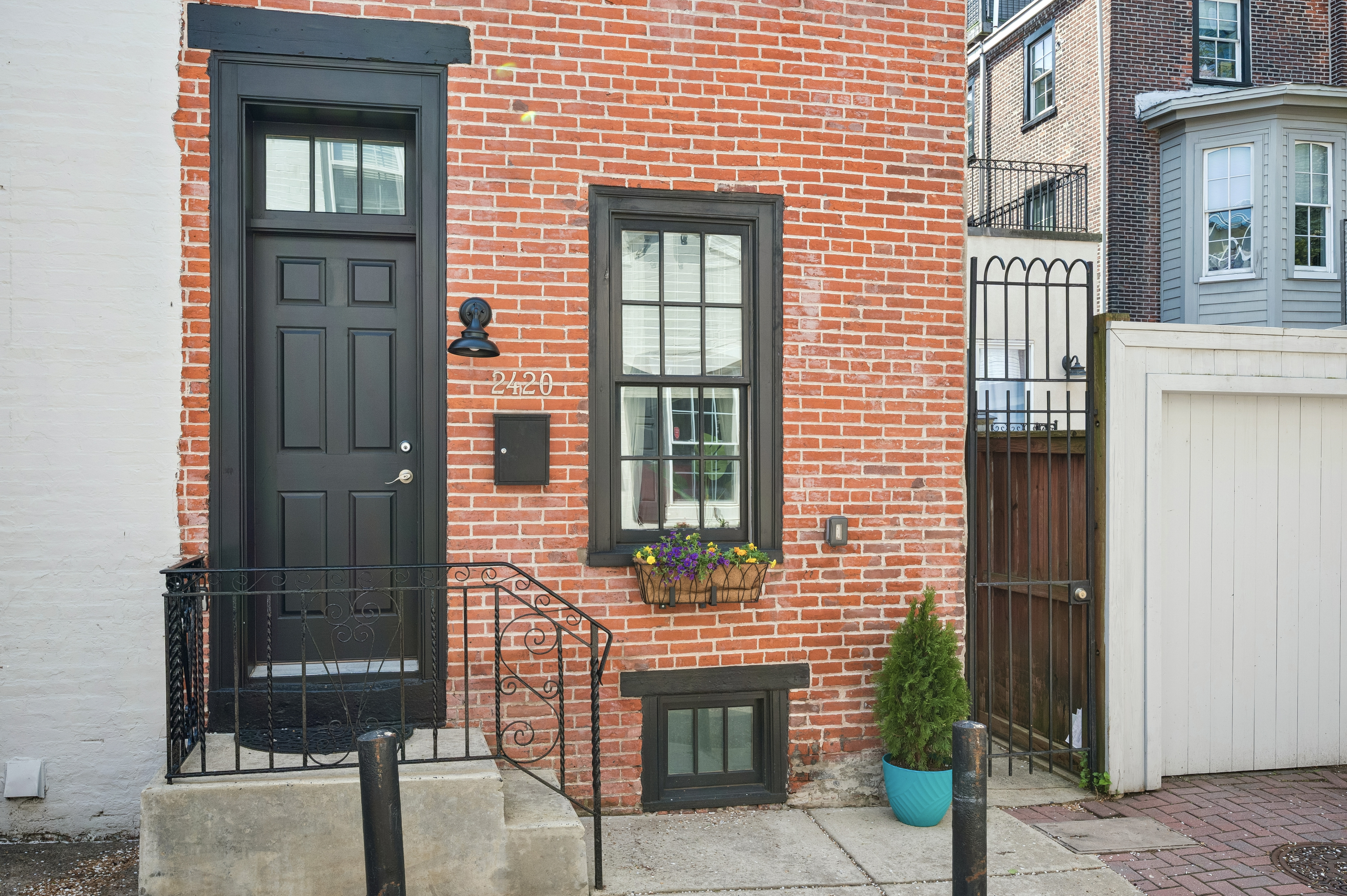 2420 Manning Street Philadelphia, PA 19103 - Photo 14 of 25 a front view of a house with a window