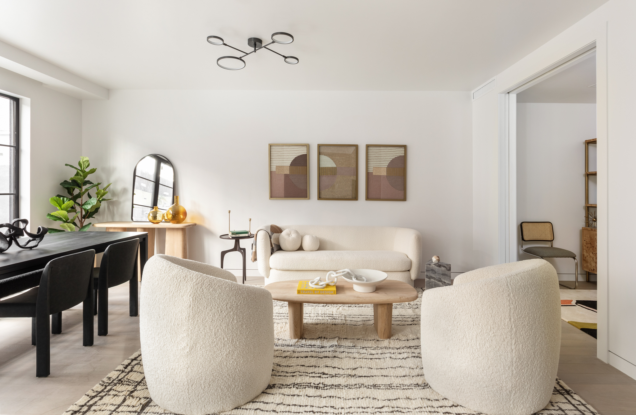 327 East 22nd Street, Unit 1A Manhattan, NY 10010 - Photo 5 of 11 a living room with furniture and a potted plant