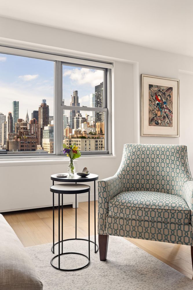 a bedroom with a bed and a desk