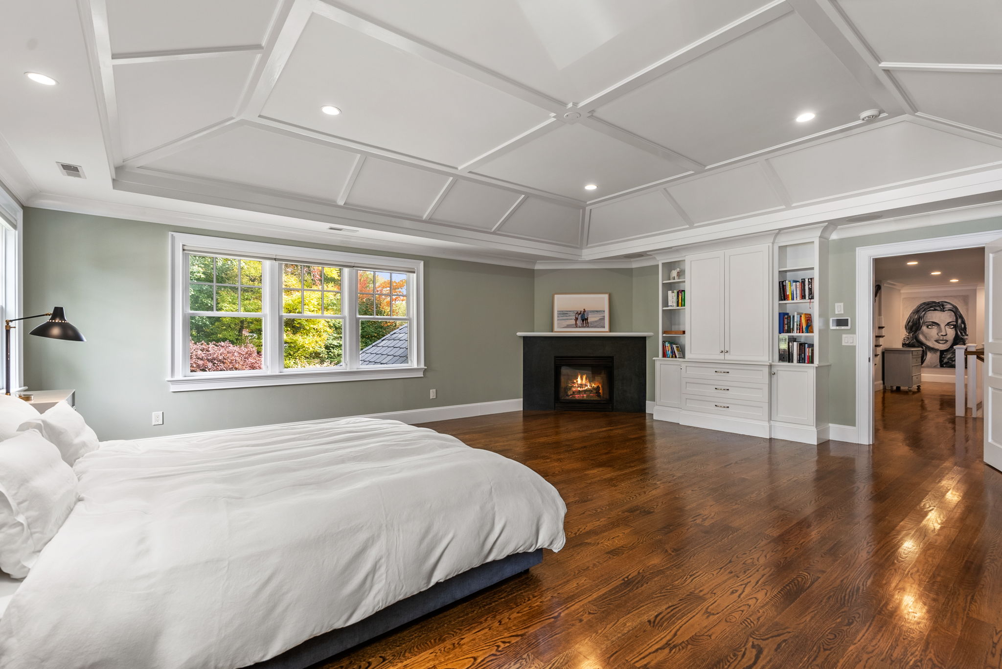 9 Wynnewood Road Wellesley Hills, MA 02481 - Photo 15 of 27 a spacious bedroom with a balcony a bed and a table with wooden floor