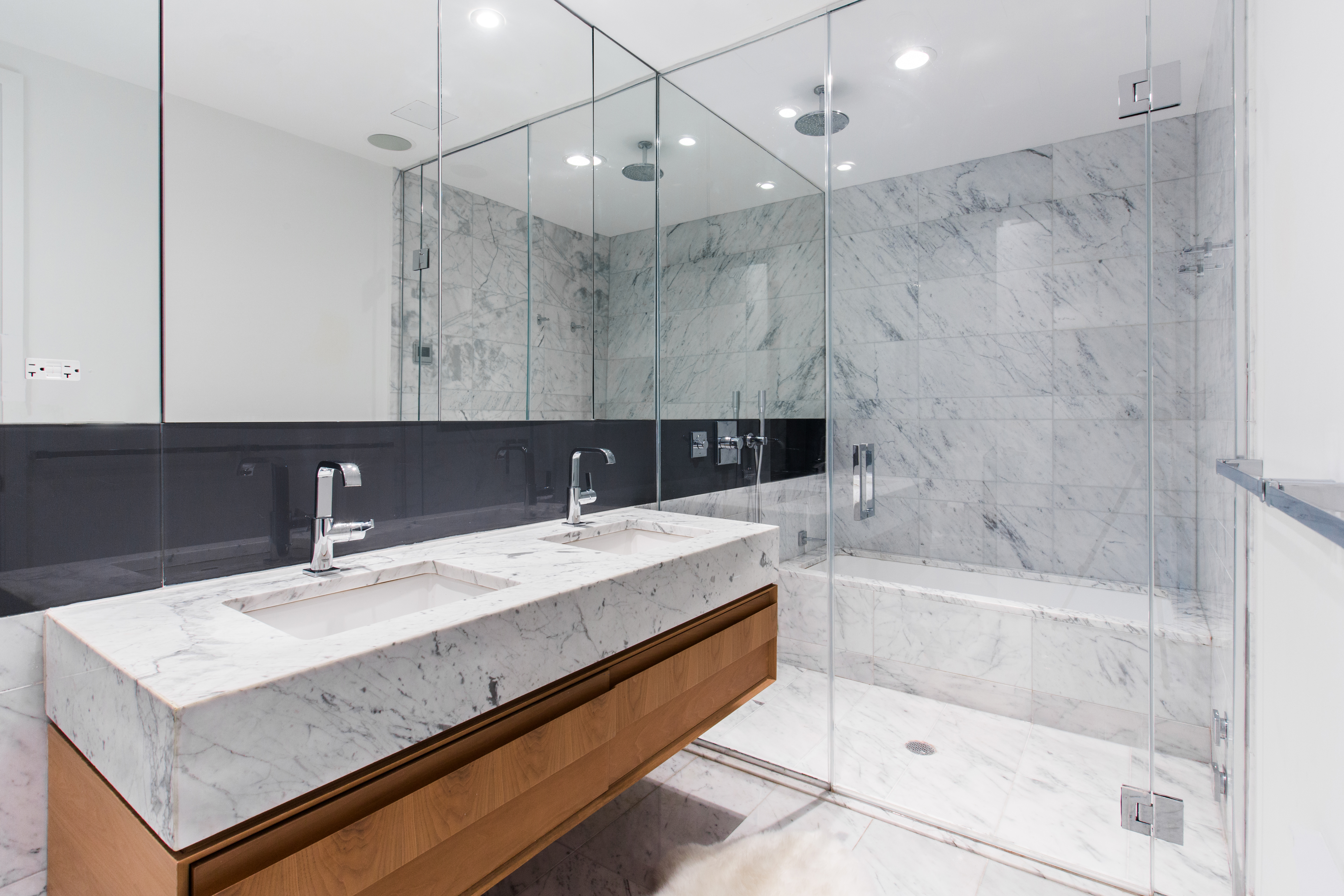 100 Norfolk Street, Unit PH Manhattan, NY 10002 - Photo 14 of 23 a bathroom with a bathtub and a sink
