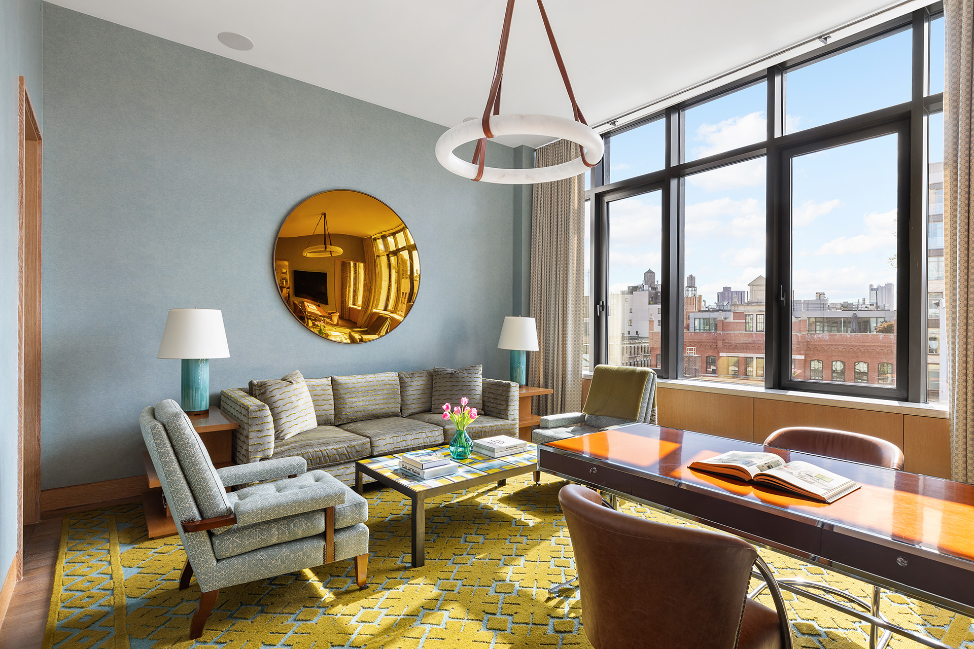 25 Bond Street, Unit PHW Manhattan, NY 10012 - Photo 12 of 34 a living room with furniture and a large window