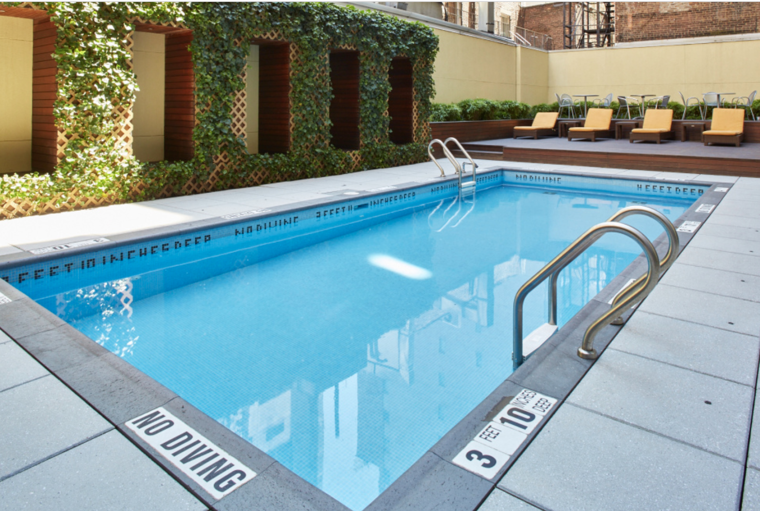 133 West 22nd Street, Unit 8G Manhattan, NY 10011 - Photo 11 of 16 a view of swimming pool with chairs