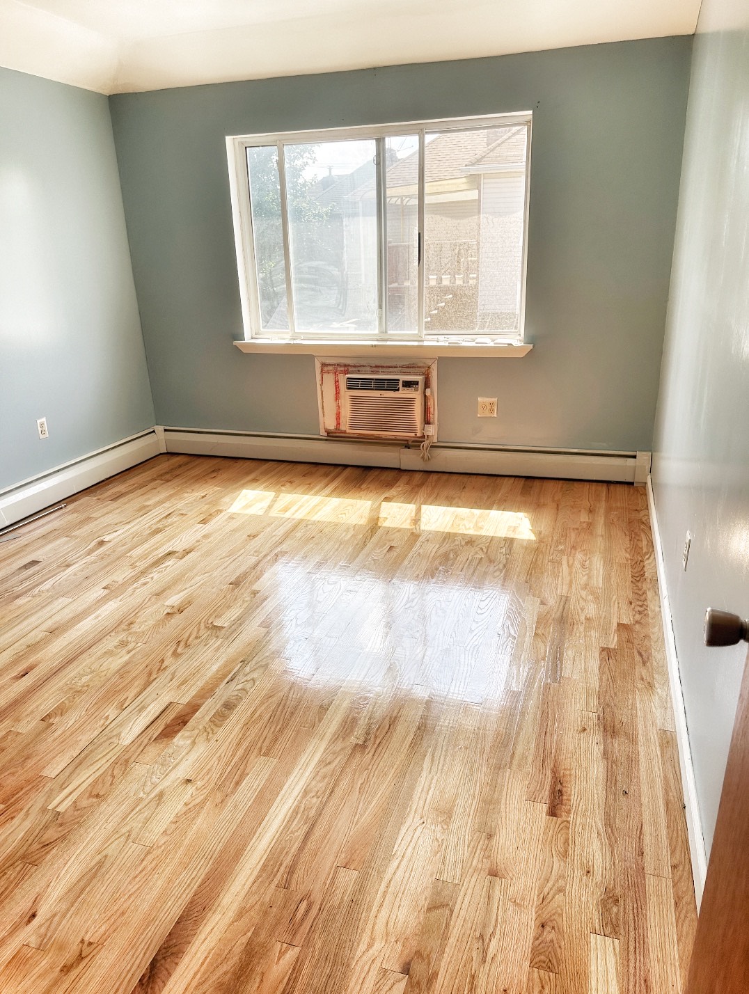 2130 Troy Avenue, Unit 2 Brooklyn, NY 11234 - Photo 3 of 4 a view of an empty room with a window