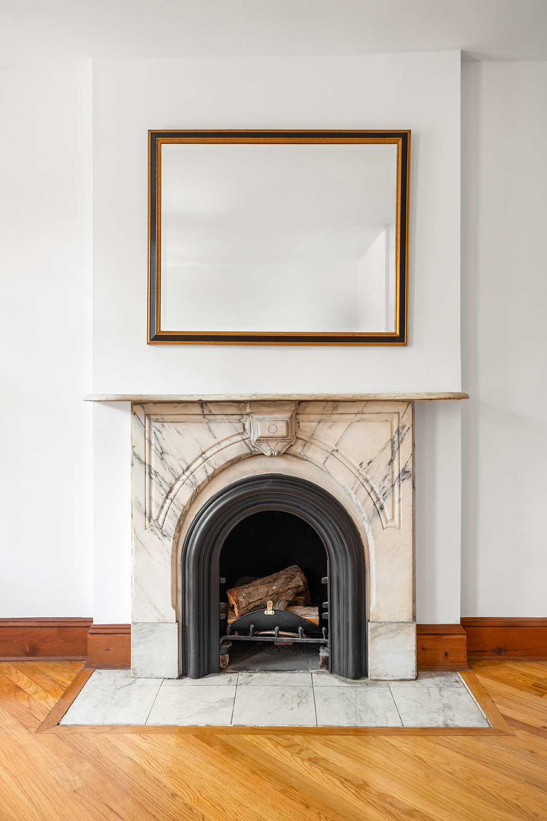 416 Clermont Avenue, Unit 3F Brooklyn, NY 11238 - Photo 4 of 12 a living room with a fireplace and a large window