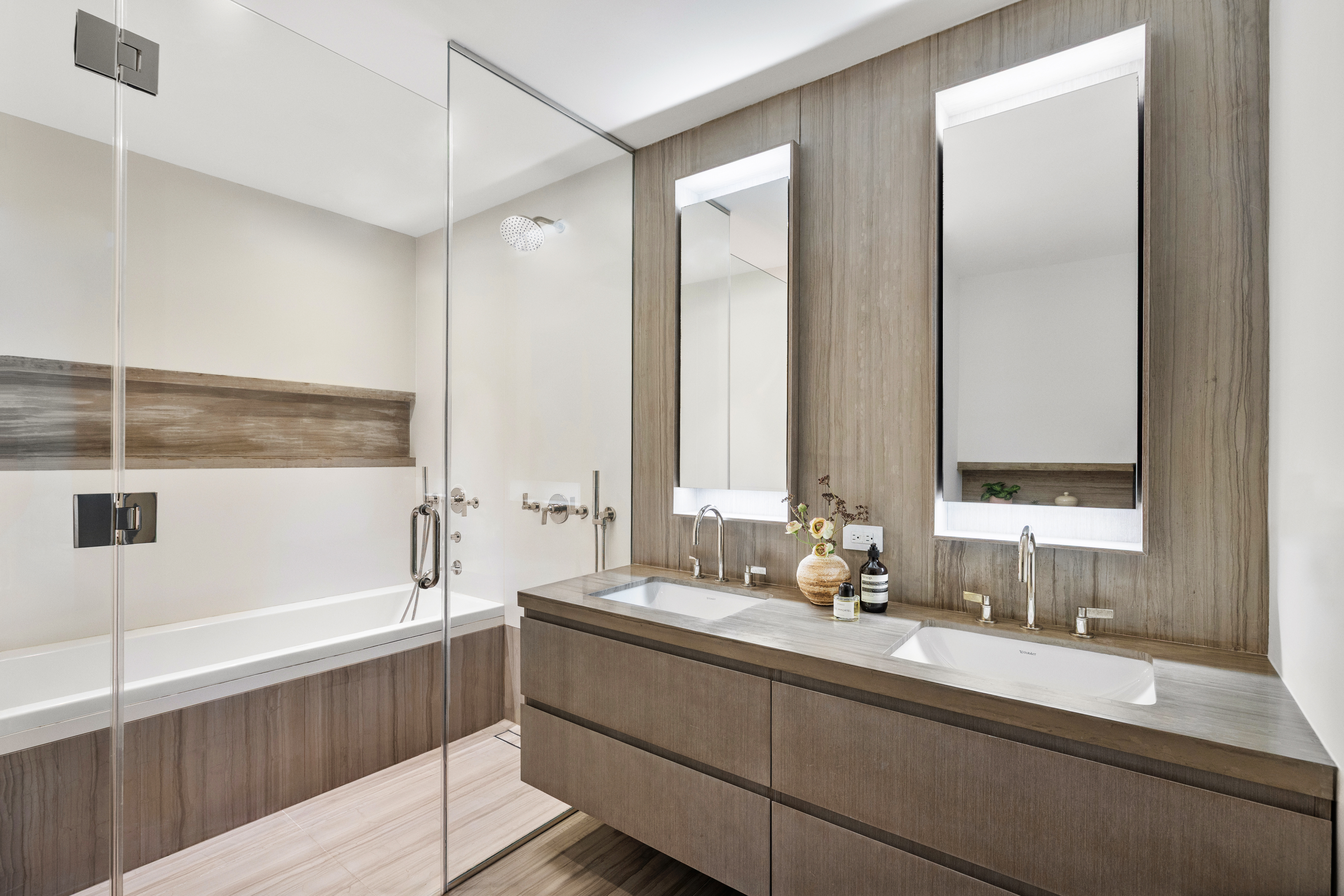 225 14th Street, Unit GARDEN A Brooklyn, NY 11215 - Photo 7 of 13 a bathroom with a double vanity sink and a bathtub