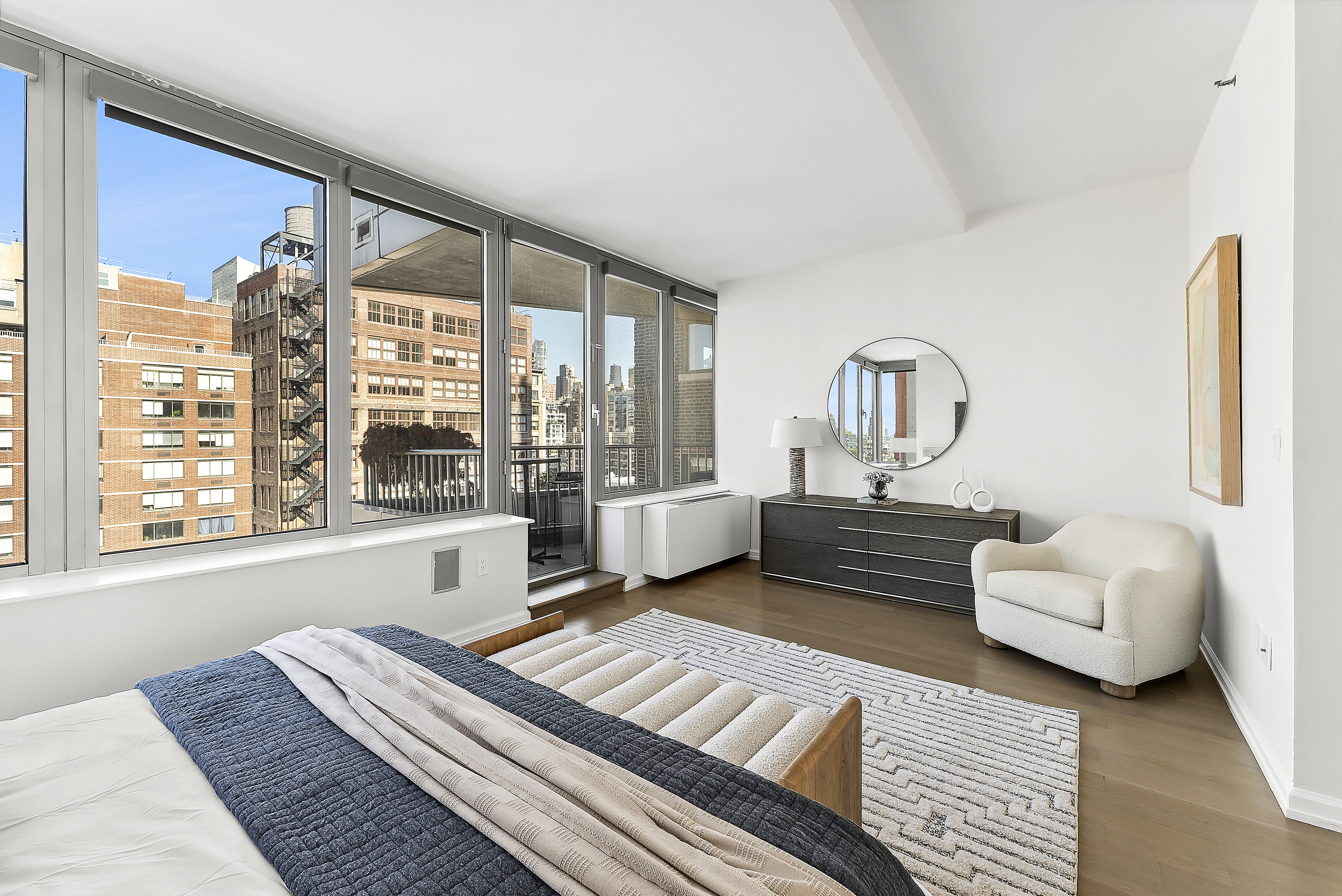 224 West 18th Street, Unit PHA Manhattan, NY 10011 - Photo 11 of 24 a living room with furniture and a window